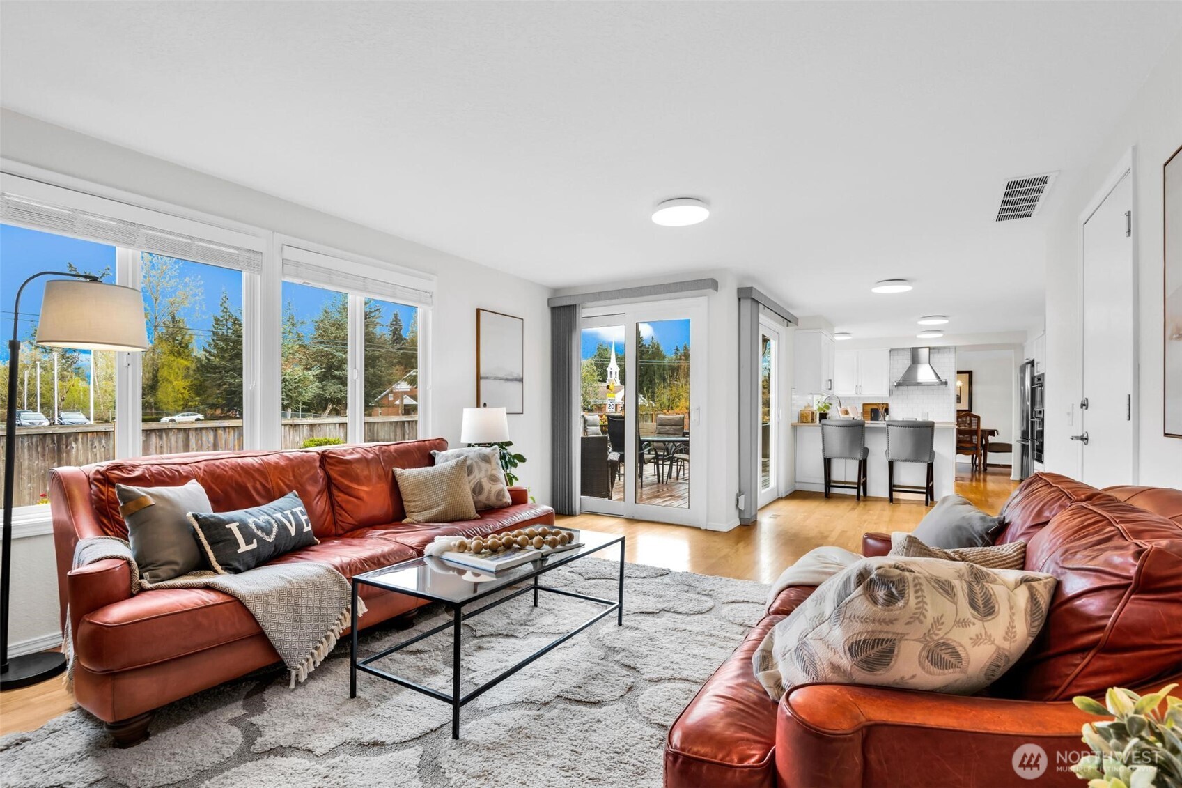 Expansive open concept casual living room with 2 slider door exit/entry for outdoor entertainment.