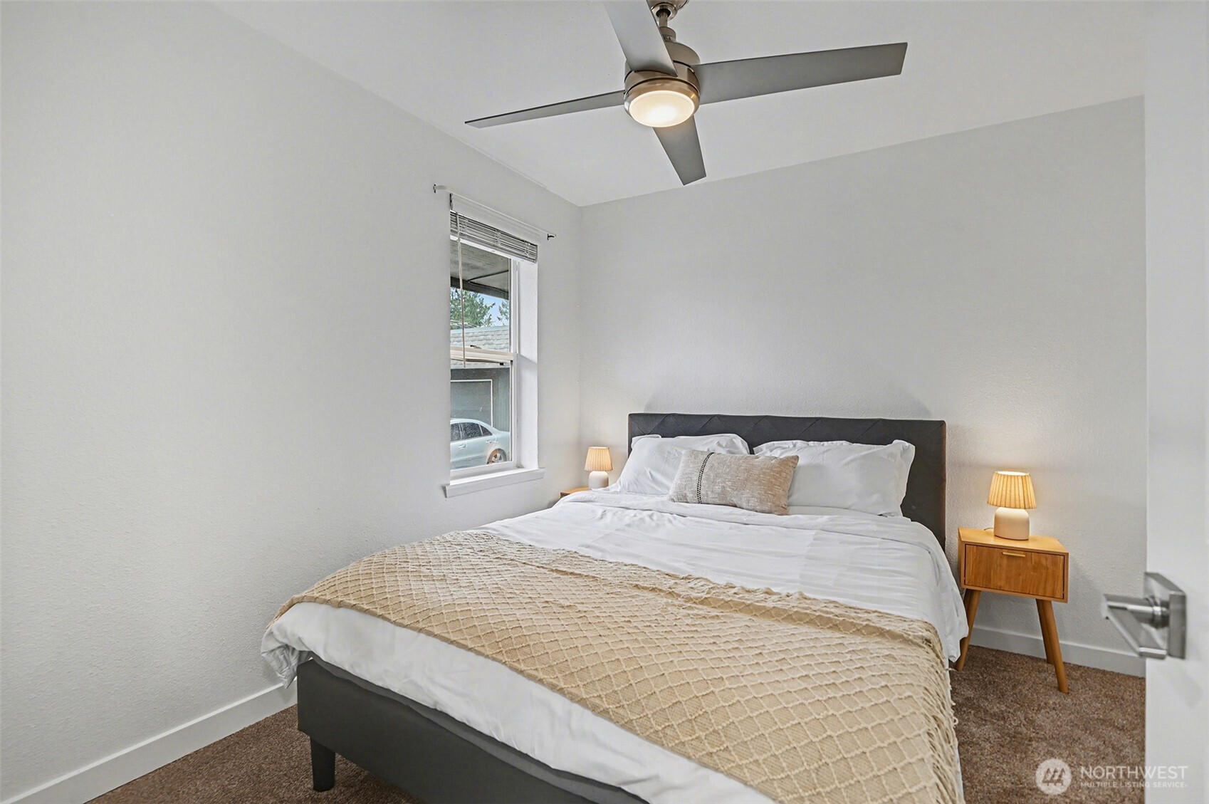 Front Bedroom - Staged with queen bed and and side tables and brand new ceiling-light fan