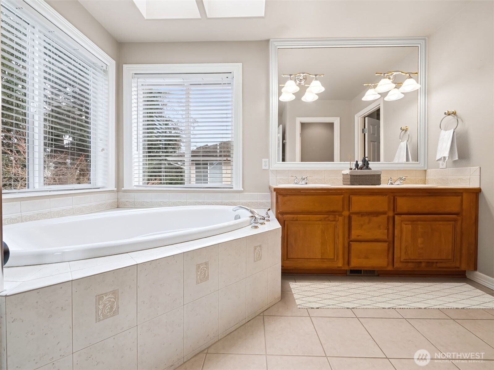 Primary bedroom with walk-in closet, 5 piece bath- virtual staging