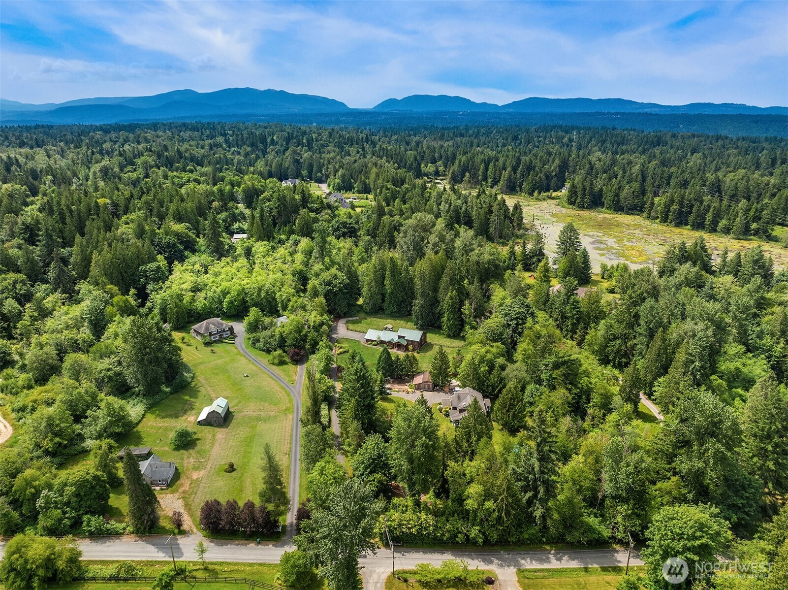 Aerial view of home, set back.