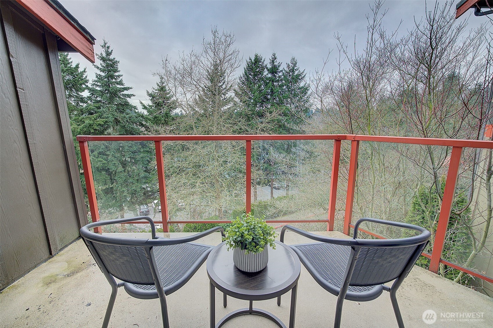 The living room is graced with a cozy fireplace.  Newer LVP flooring is featured throughout.