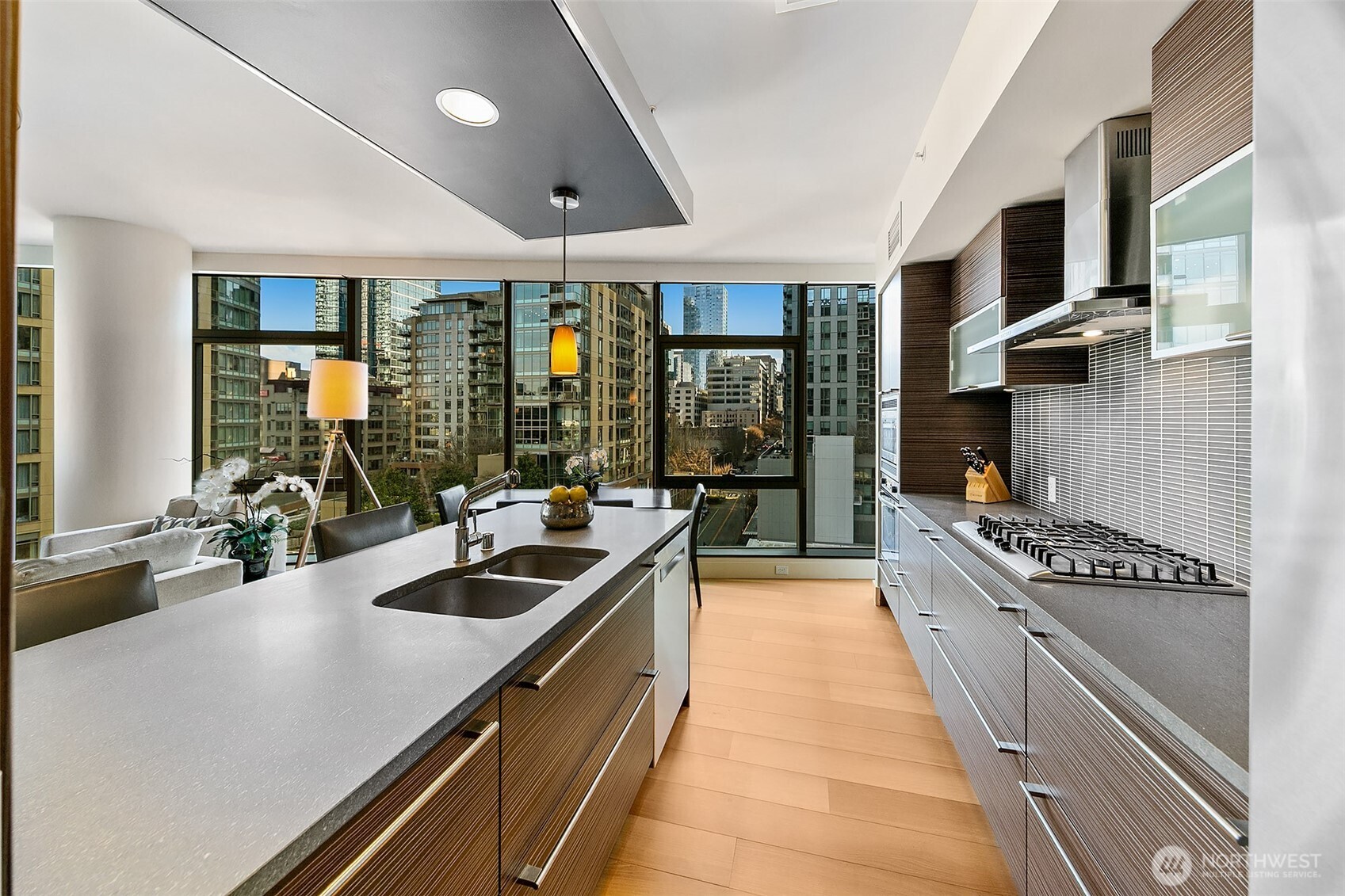 City views on display day and night while creating culinary delights.