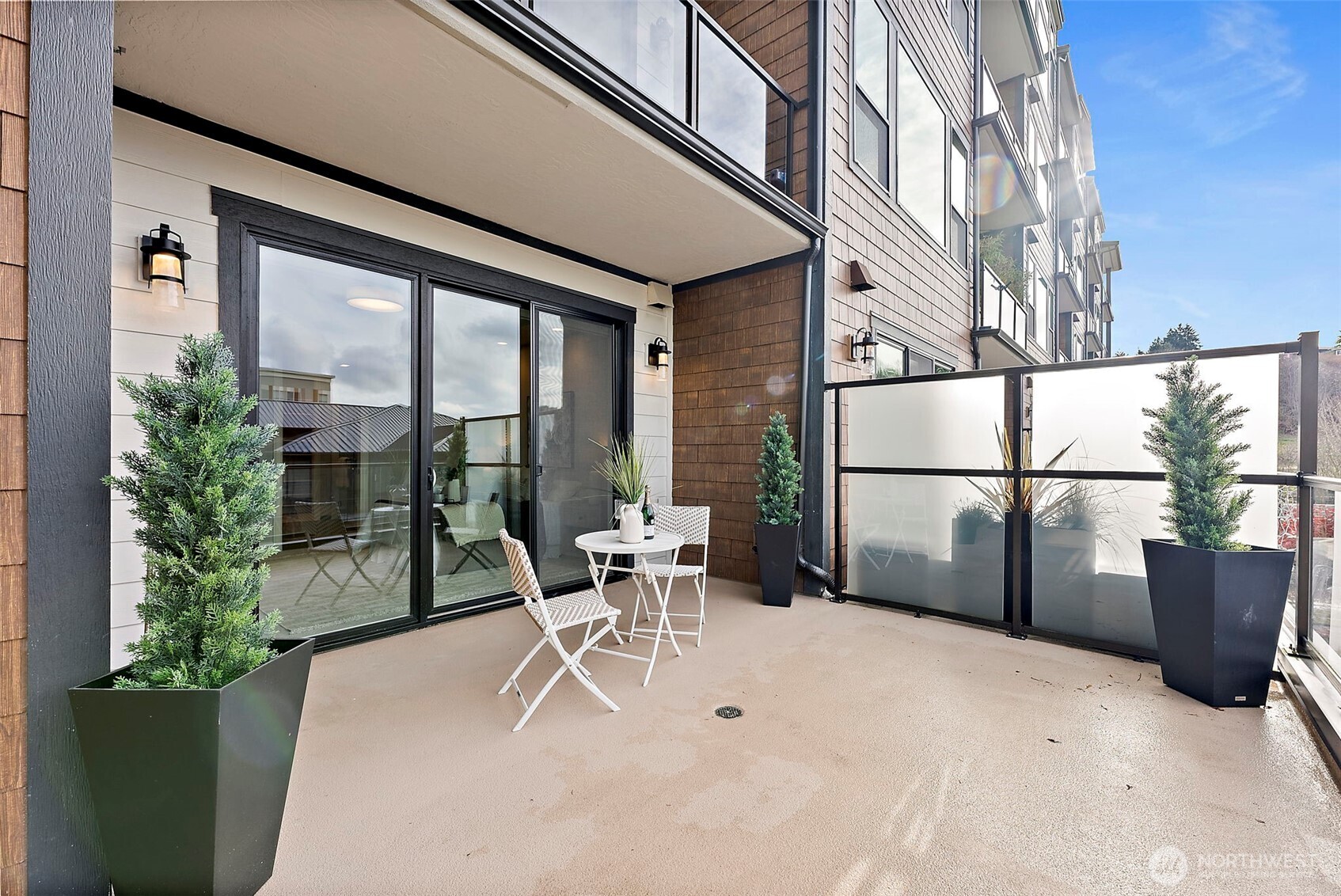 Deck space off the primary suite with partial covering