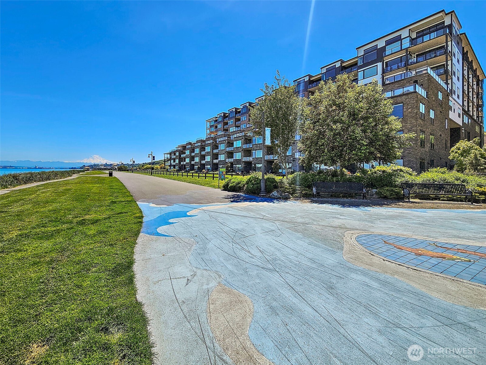 Point Ruston waterfront walking path runs along the back end of the Rainier Condo building