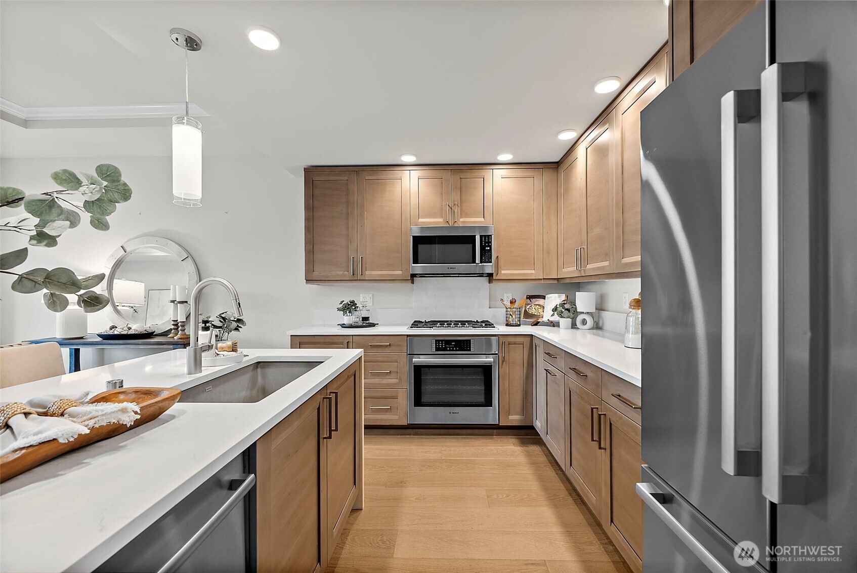 Dishwasher and undermount kitchen sink located situated in the island