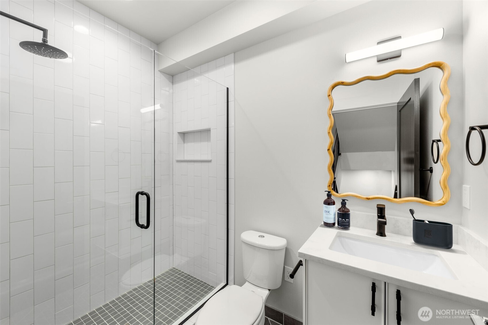 A peaceful sanctuary featuring large windows that invite the outdoors in, creating a calm and restful atmosphere