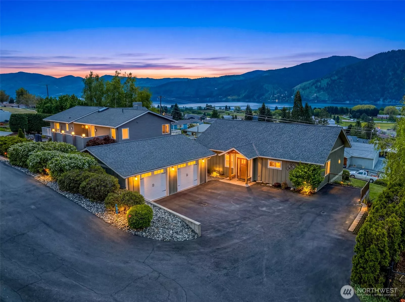 Sweeping lakes views of Lk Chelan, this 4 bdrm, 3 bath home checks all the boxes.  Great neighbors and no HOA.