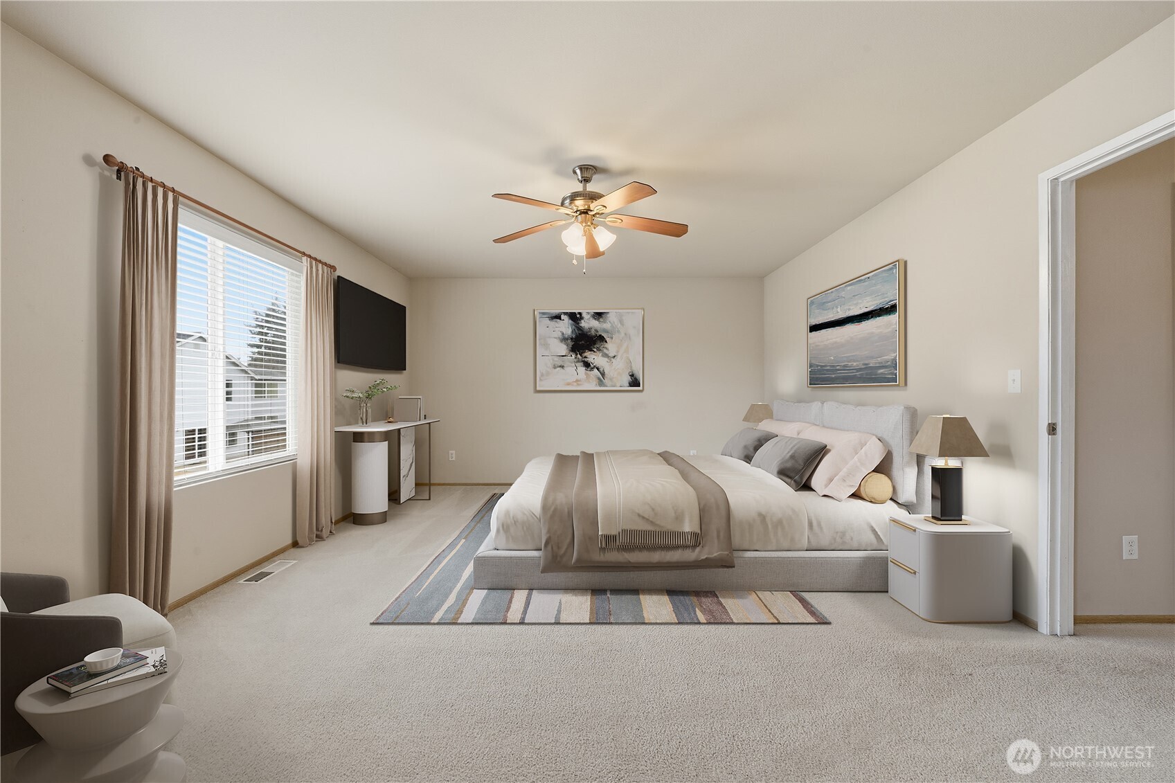 Spacious primary bedroom with comfortable proportions.