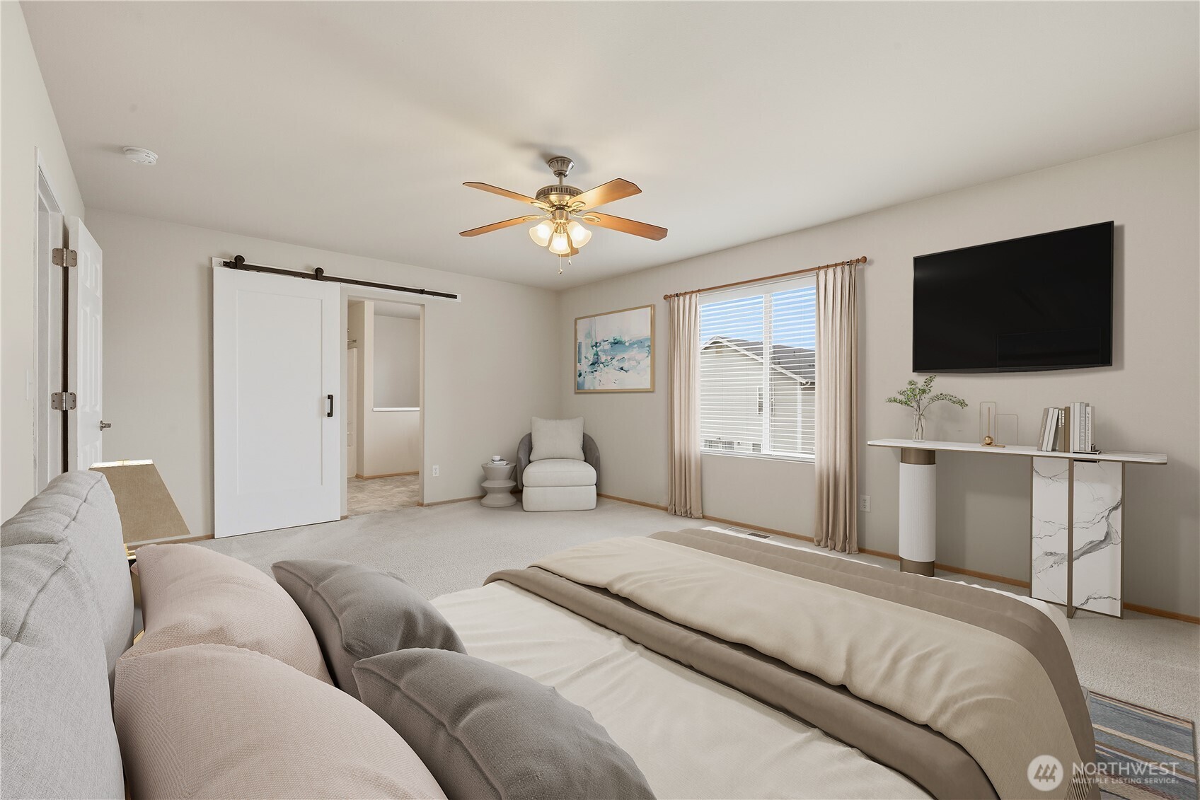 The primary bedroom is well-designed layout for privacy and comfort.