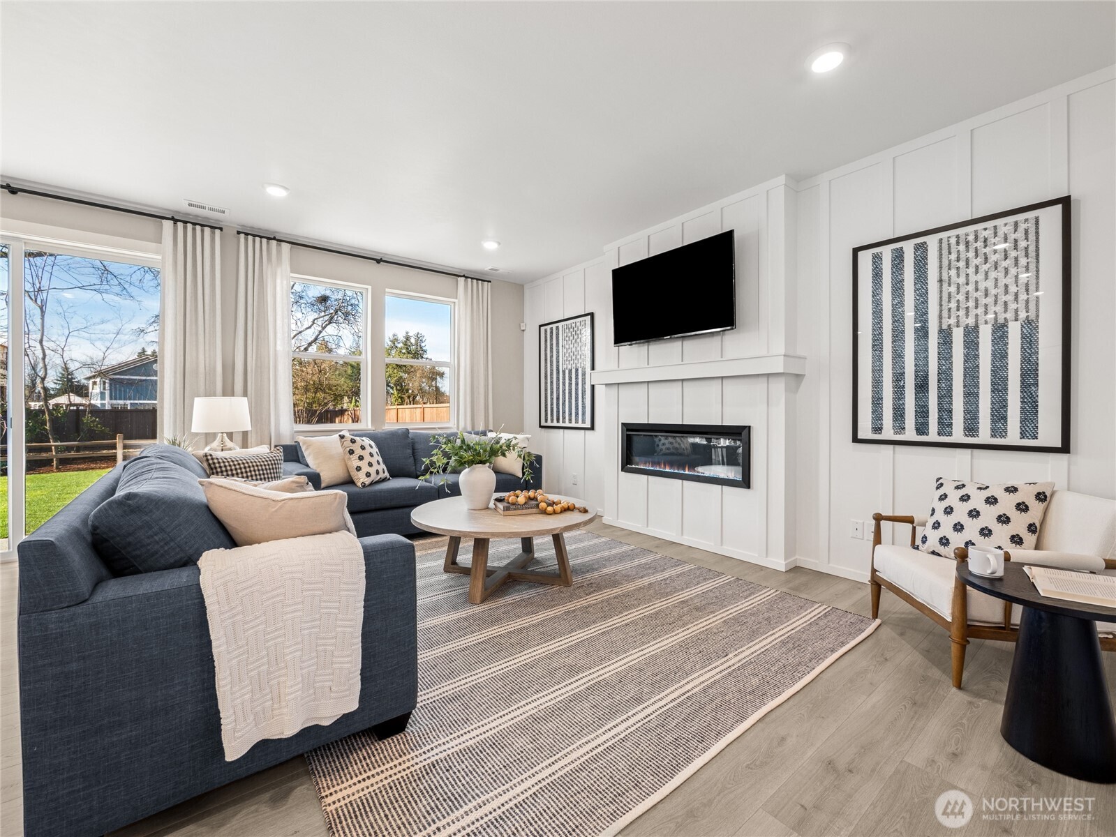 The open design of this home has the family room open to the kitchen and separate dining room.  Picture for representational purposes only, colors and features may vary.