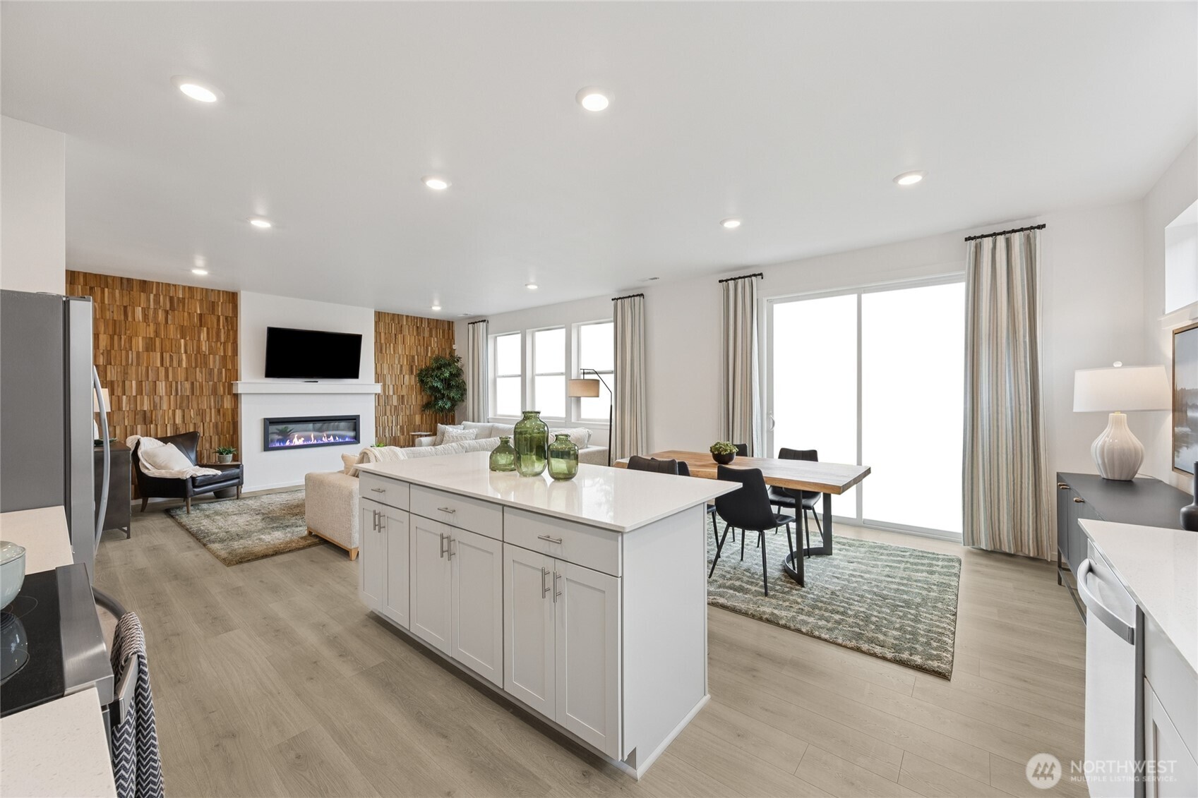 Great room design provides ample light in the living areas of your new home.  Picture for representational purposes only, colors and features may vary.