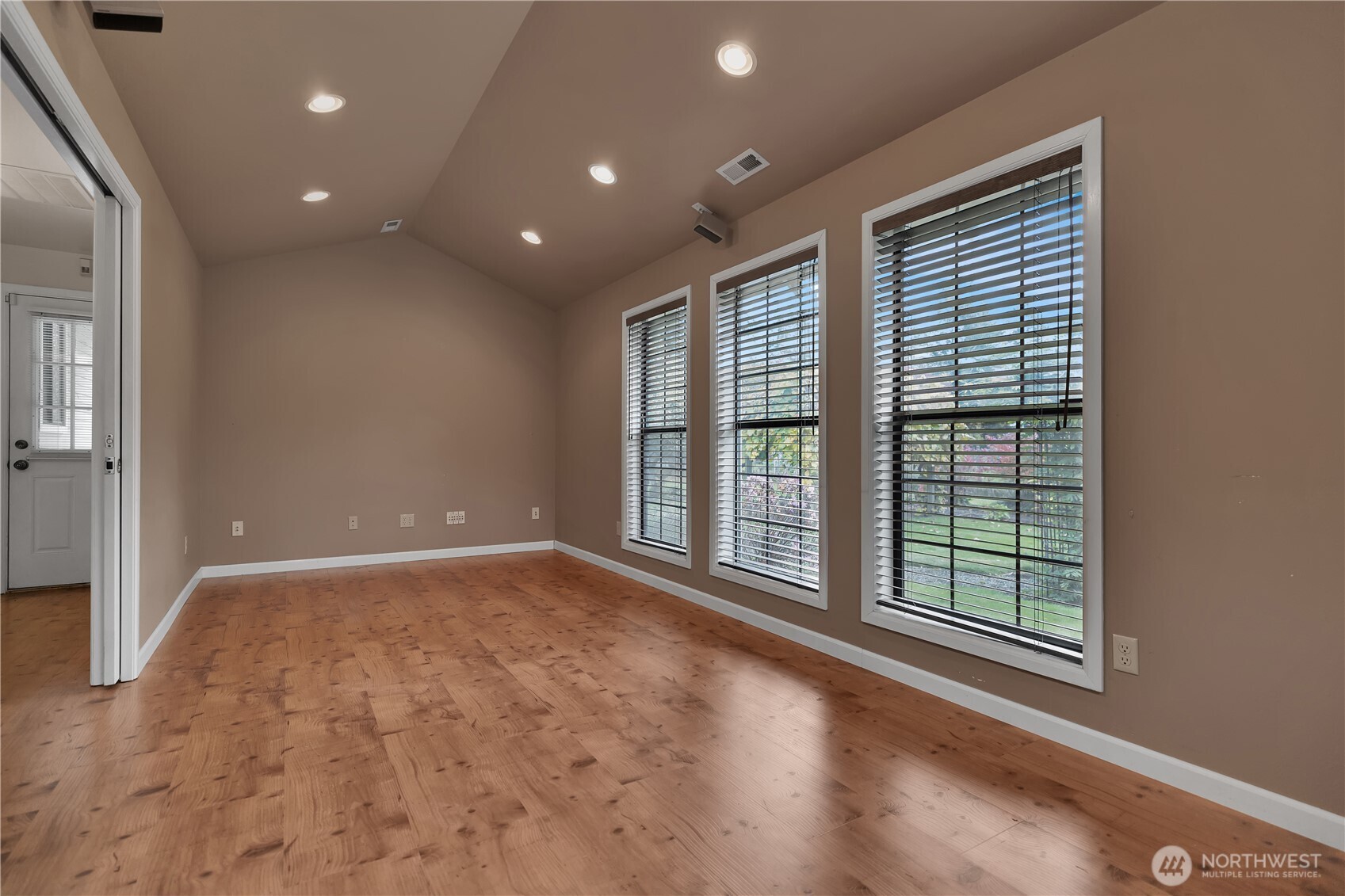 Another view of this flexible space with beautiful flooring.
