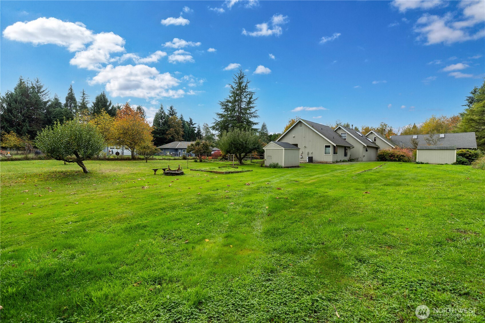 Expansive lawn area suitable for play or entertaining.