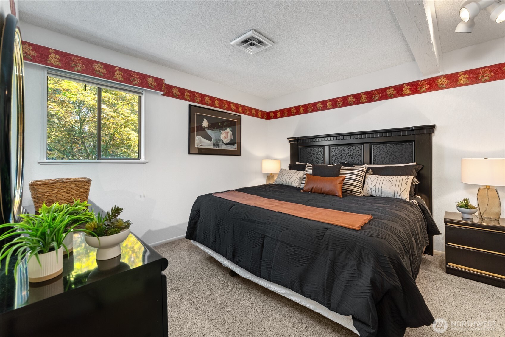 Spacious Primary Bedroom with King size bed.