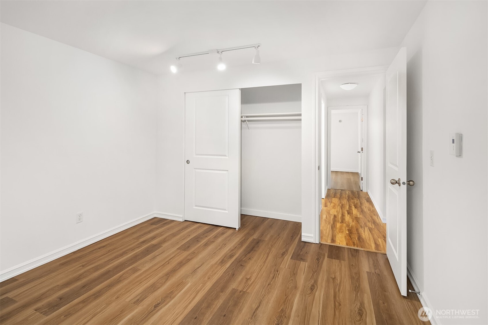 One of two, roomy private bedrooms with hard surface LVT flooring.