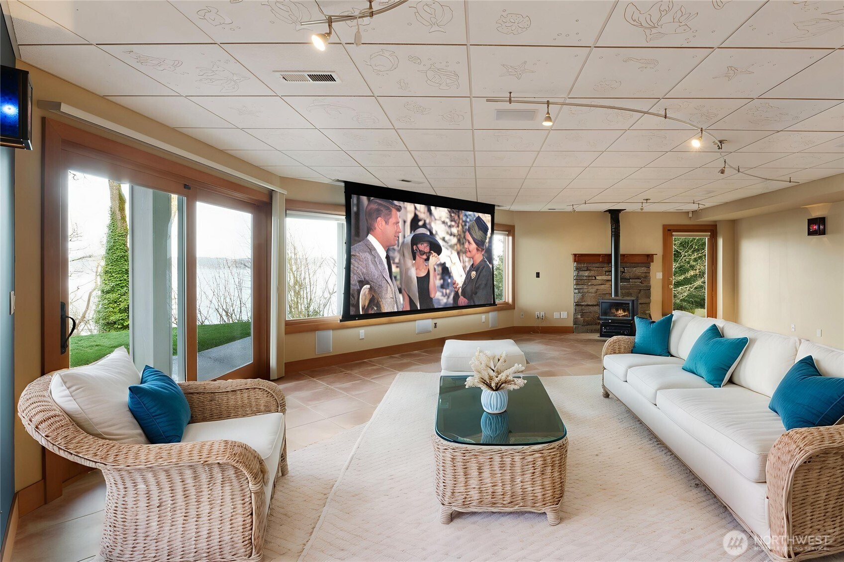 Virtually Staged, projector screen retracts into ceiling.