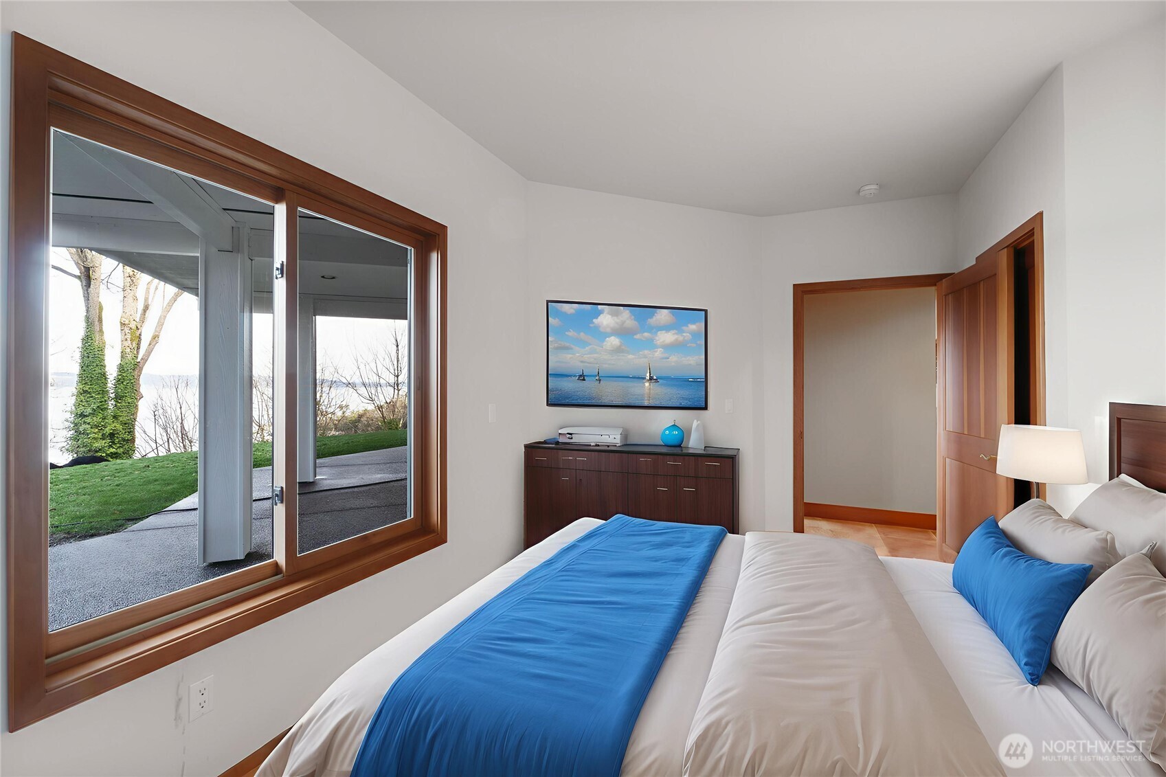 Virtually Staged Bedroom 3 (two of two bedrooms in basement). All bedrooms have walk-in closets.