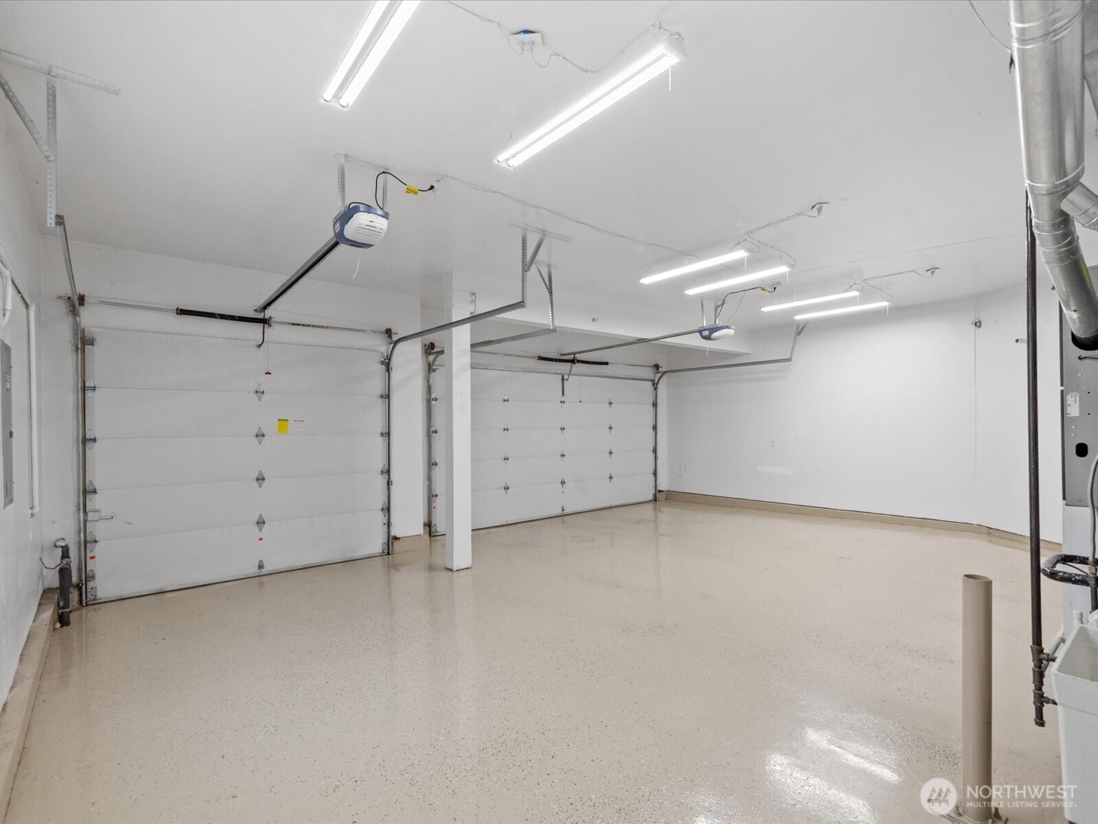 Large laundry room with lots of built-in storage and extra deep utility sink.