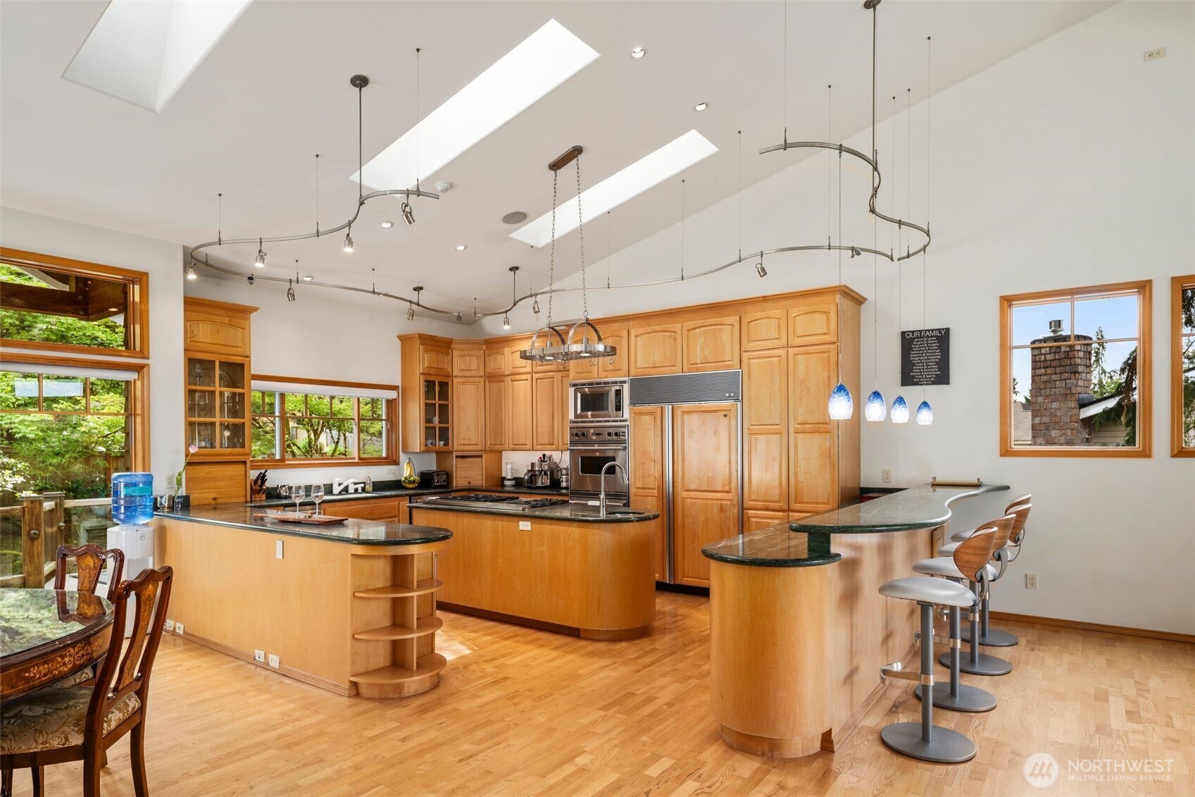 Kitchen and dining spaces from hallway