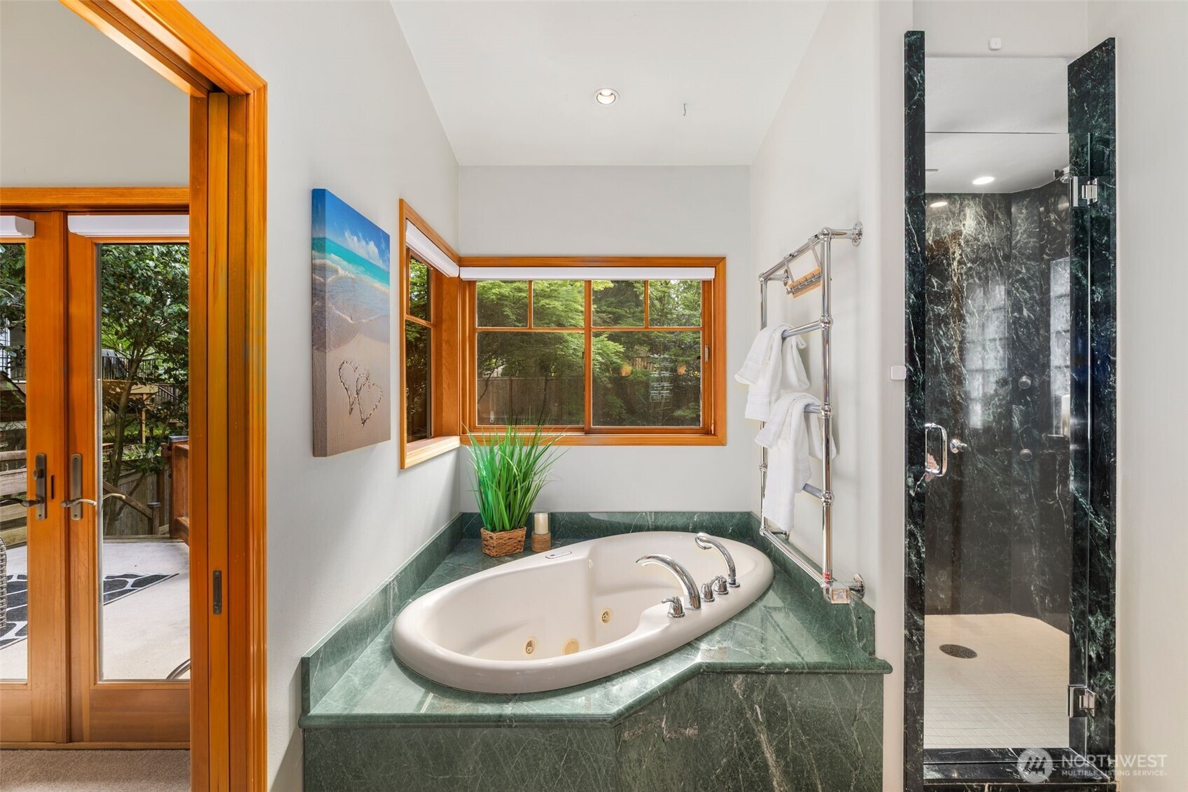 Soak in your tub overlooking your garden space in privacy and great light!