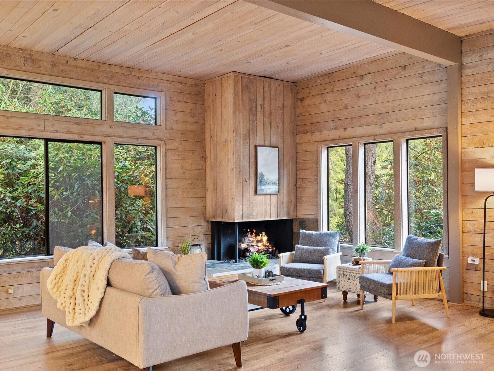 Very spacious inviting warm living room with gas fireplace