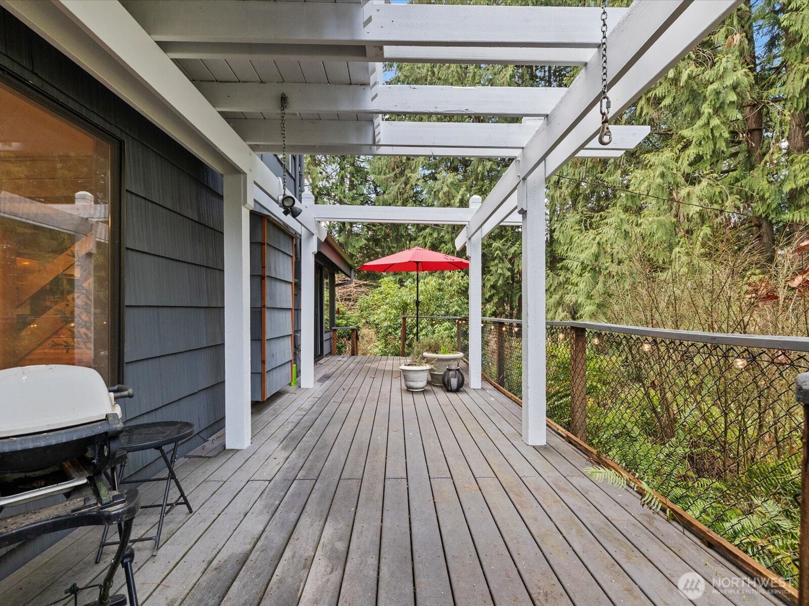 Back deck right off kitchen eating space overlooks creek.