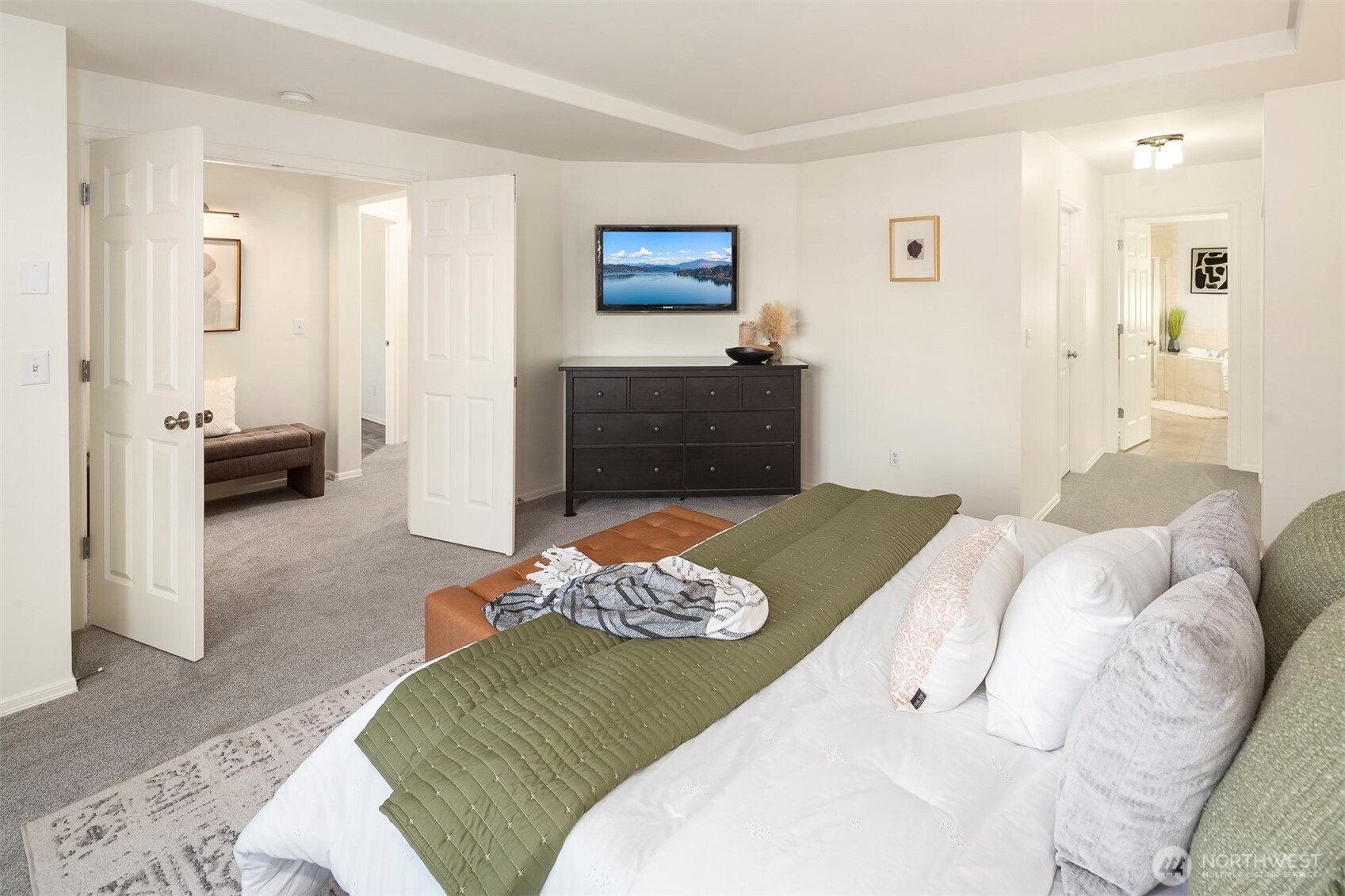 Primary bedroom with walk-in and full-size closets.