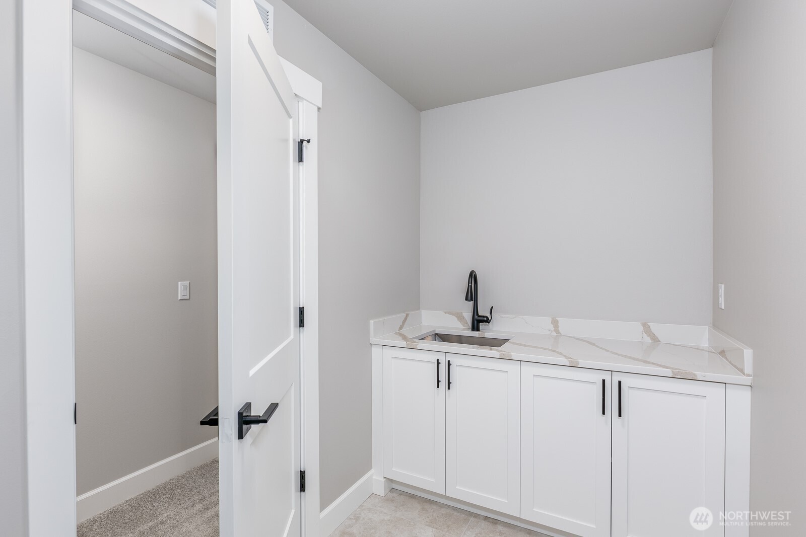 A 3/4 bathroom adjoins the Bonus room/Jr Ensuite on the entry level.