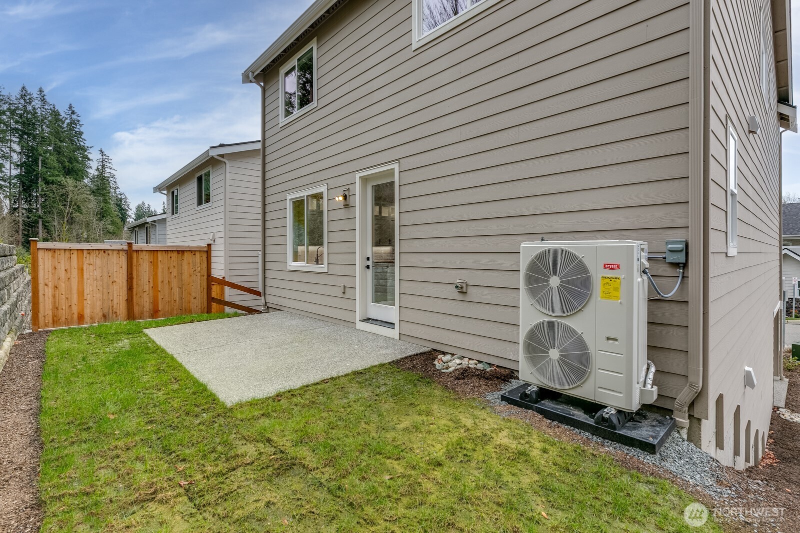 The backyard is a peaceful sanctuary surrounded by the sights and sound of nature.