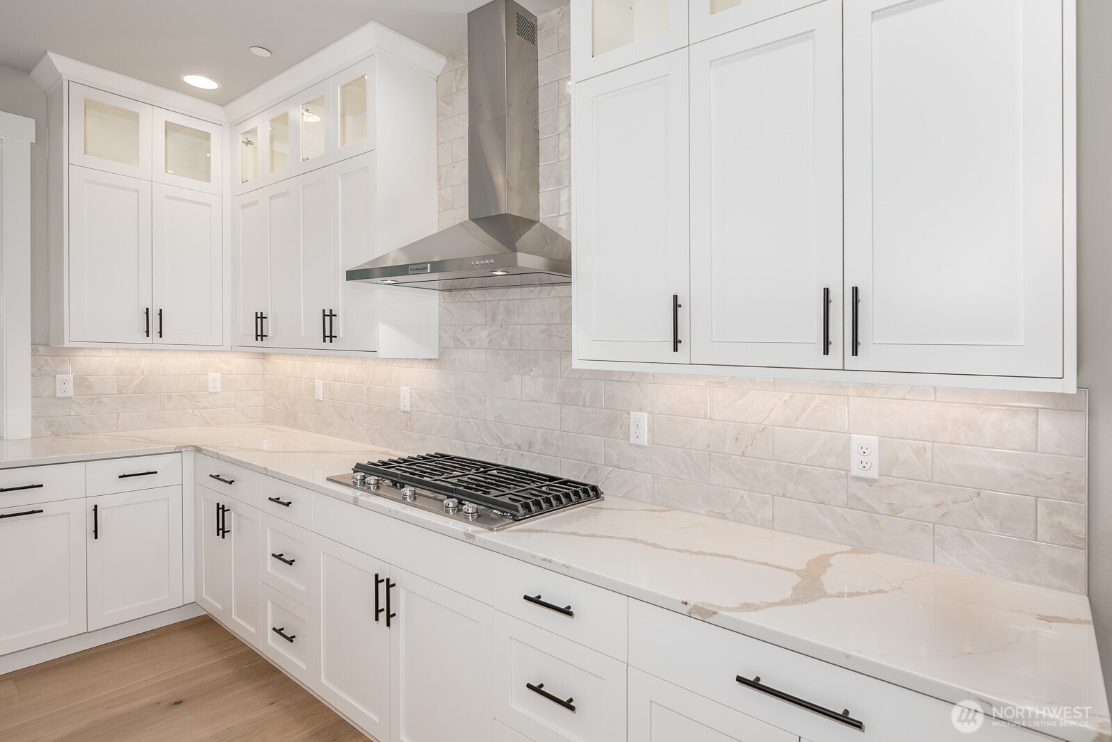 The expansive Great Room is ideal for all sizes of gatherings.  High quality extensive hardwood floors flow through the main living areas.