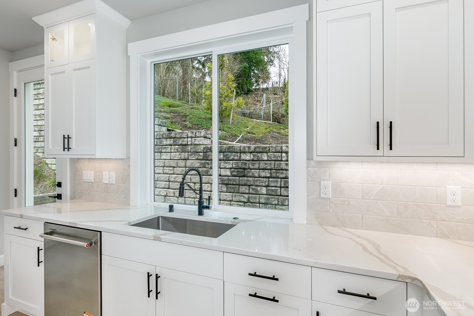 Relax on the covered deck and enjoy sunsets and territorial views of evergreens.