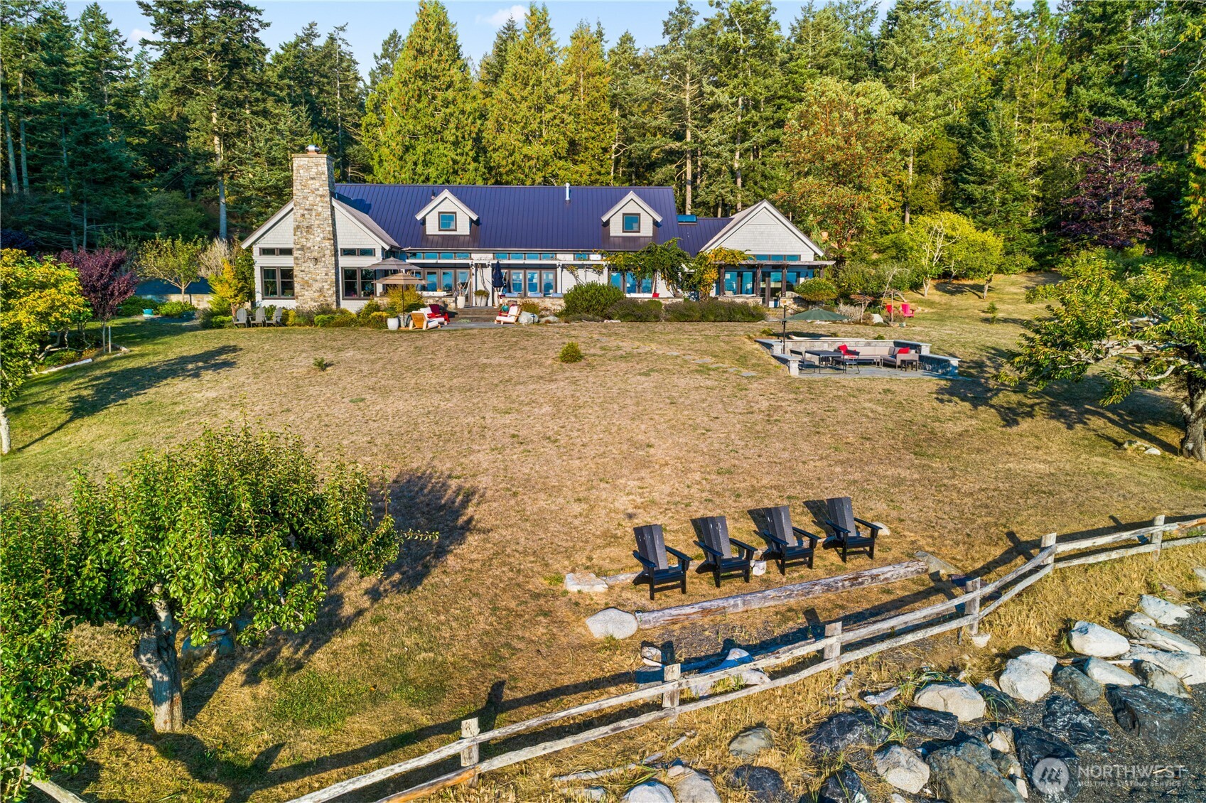 5 acres of beach, forest, lawn, landscaped gardens and a prolific small heirloom fruit tree orchard.