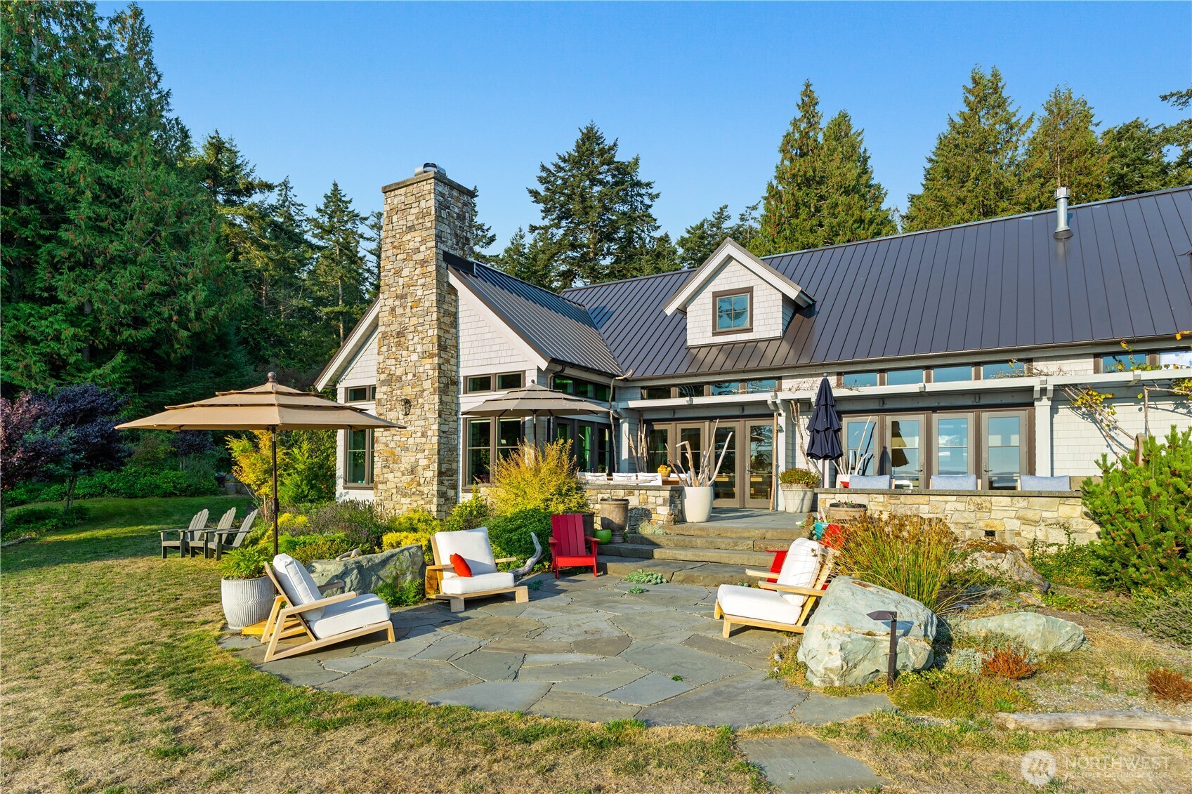 Expansive blue stone patios allow for entertaining large groups.