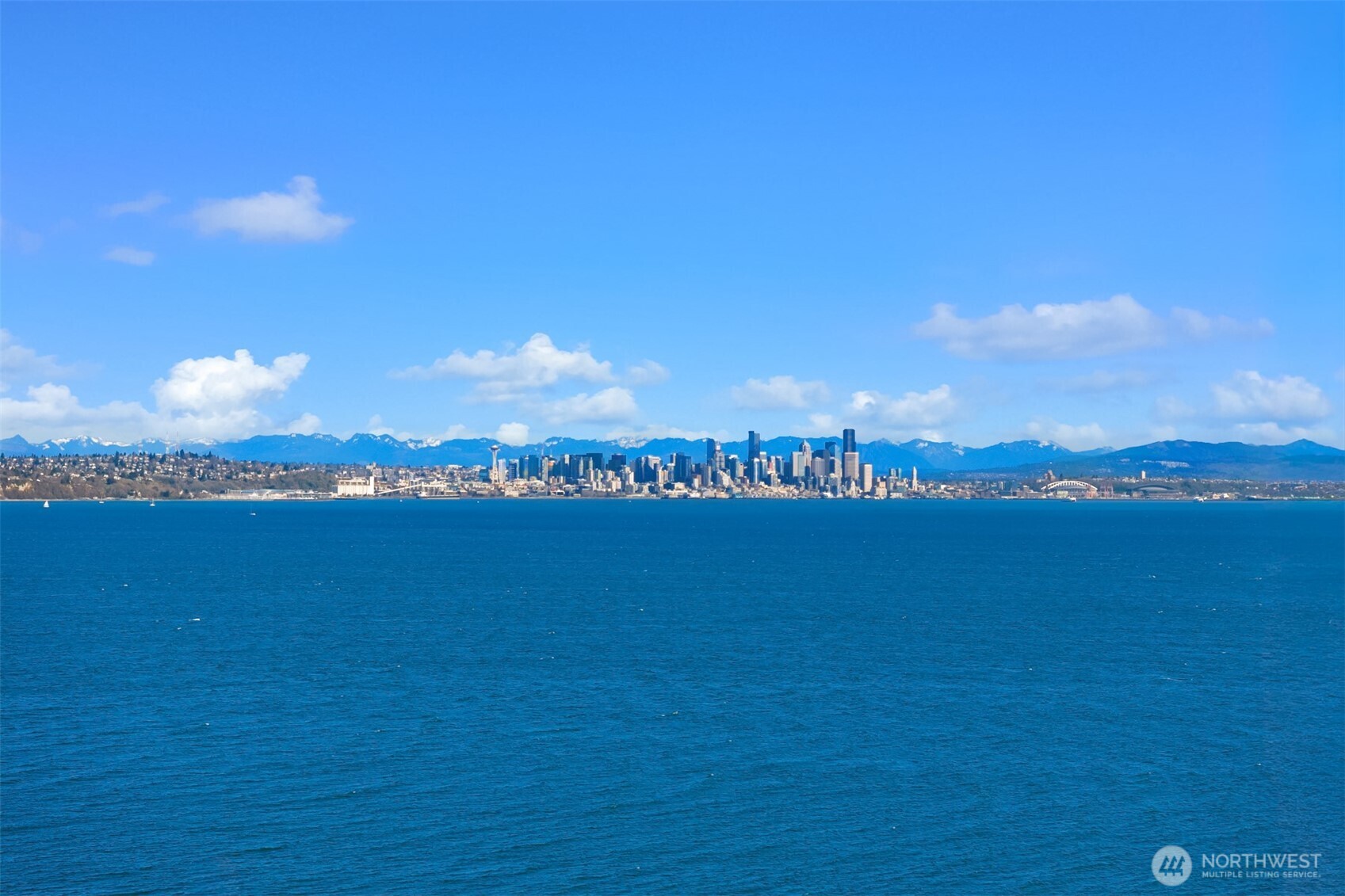 Beck waterfront patio with custom wood burning fireplace