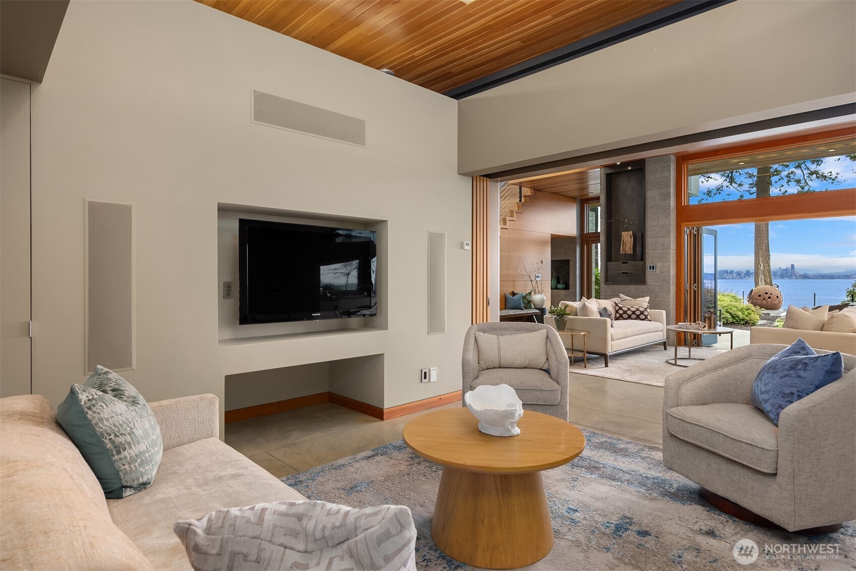 Main house living and family room with folding doors for privacy