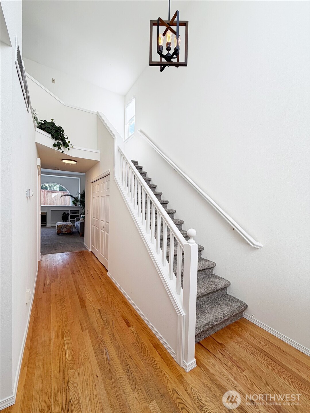 Grand entry with wood floors