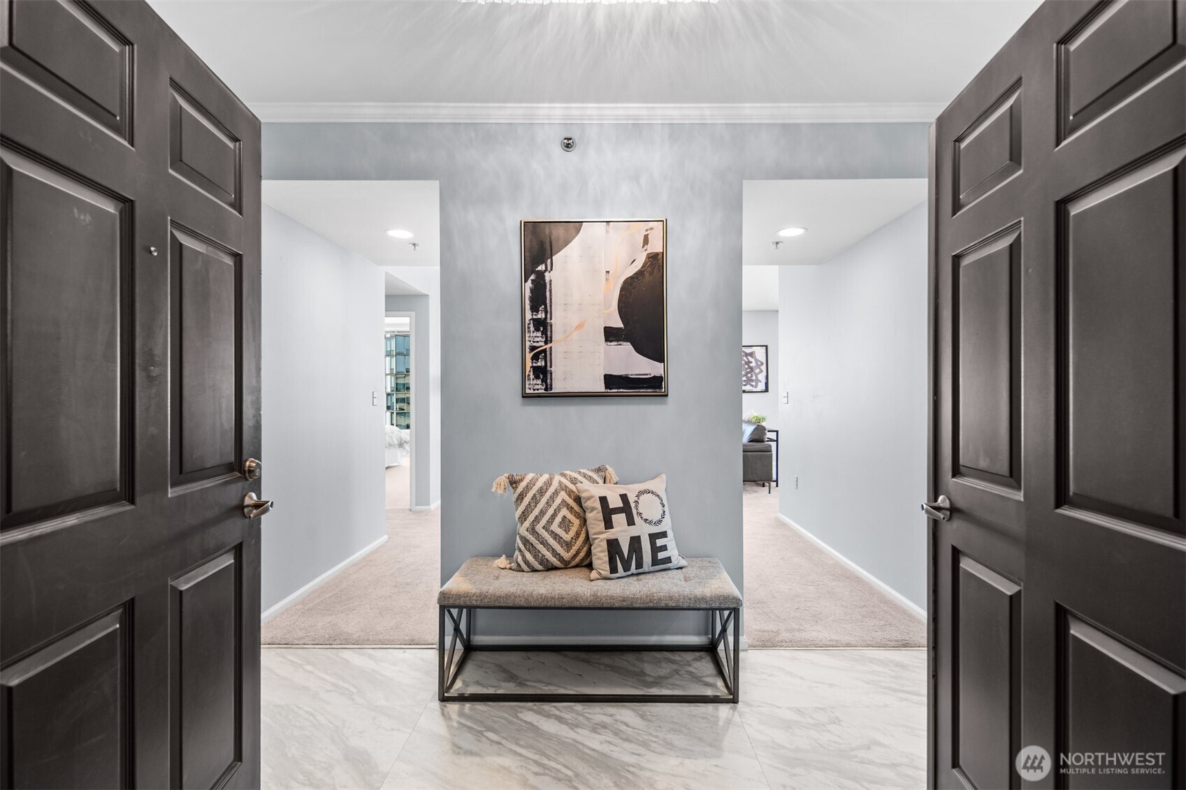 Bright interior with expansive windows and urban views