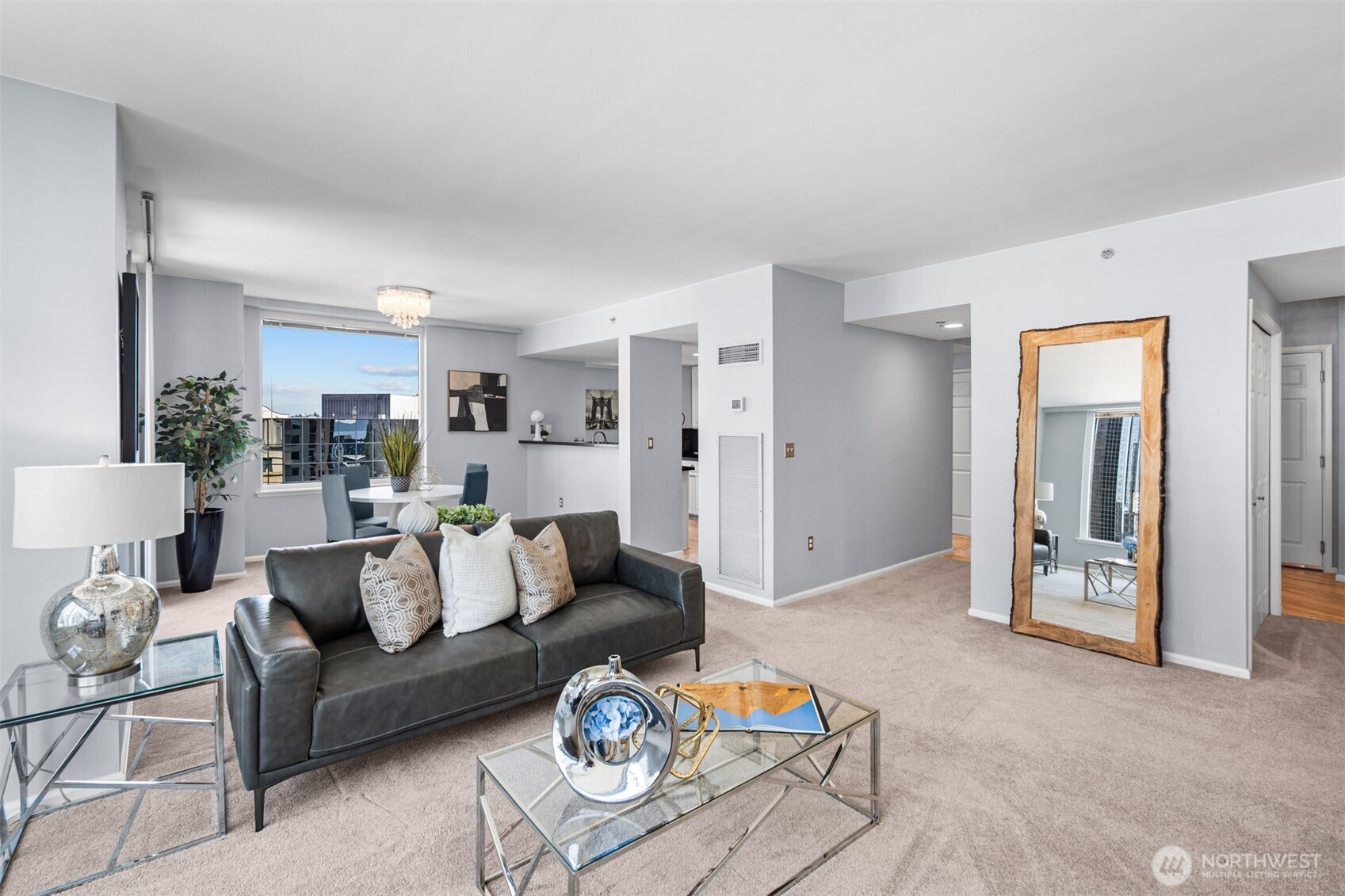 Downtown Bellevue condo at Bellevue Pacific Tower with sweeping Cascade Mountain and city skyline views