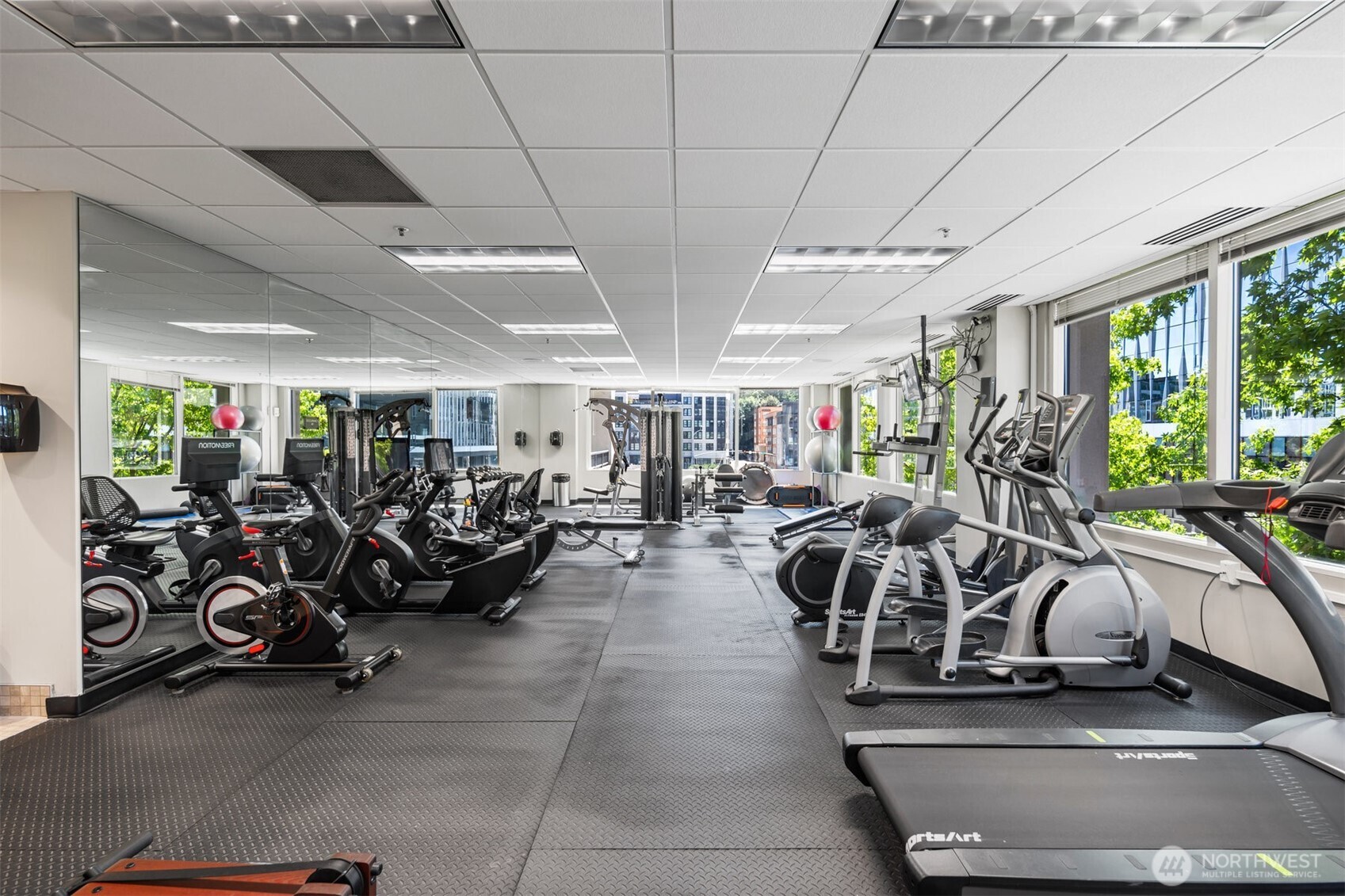 Fully equipped fitness center in Bellevue high-rise community