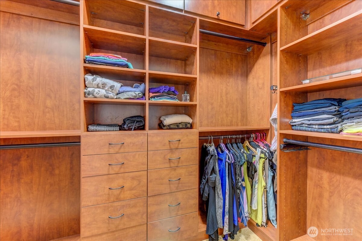 California Closet system and walk-in closet in primary