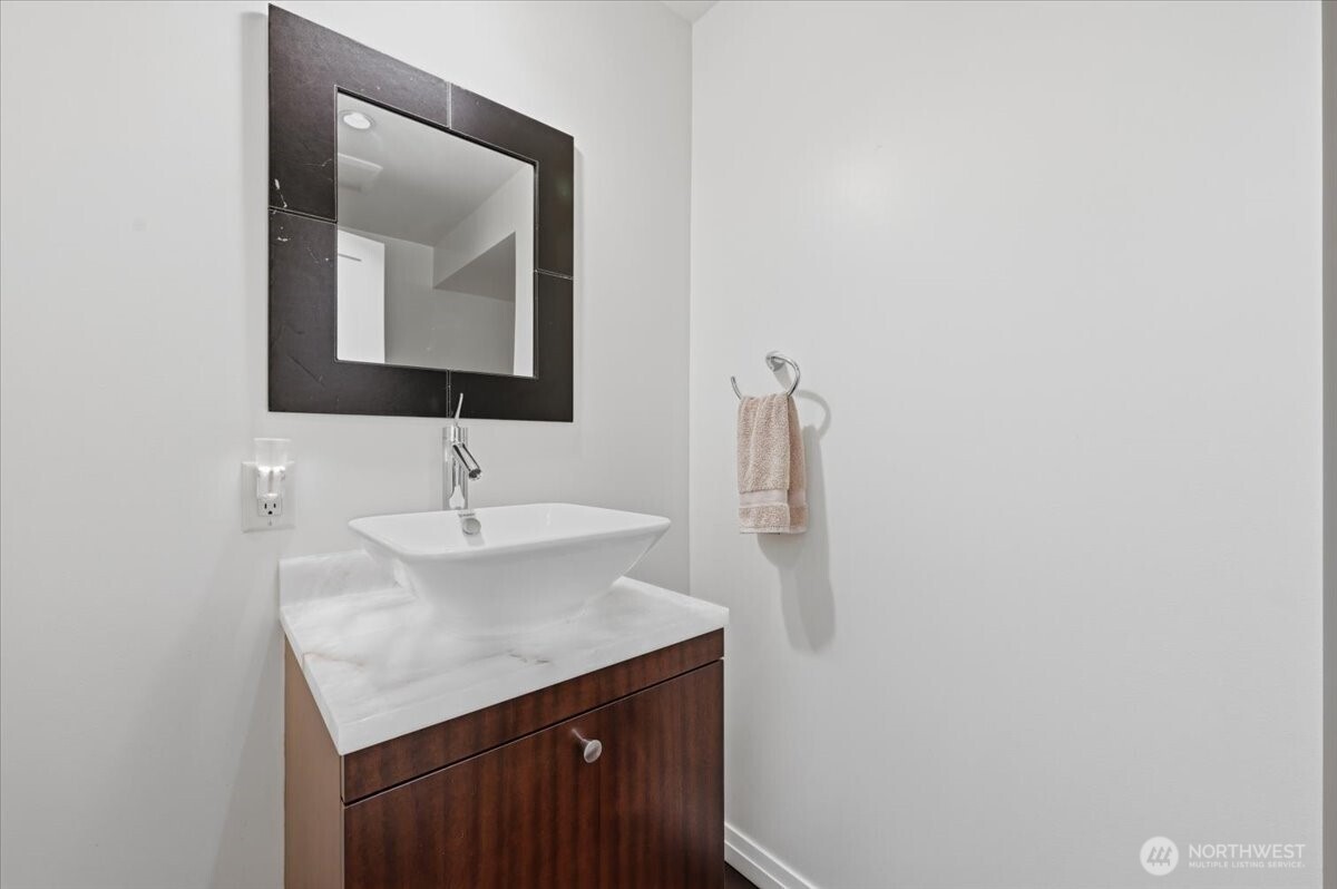 Powder room with Cristallo backlit stone counters
