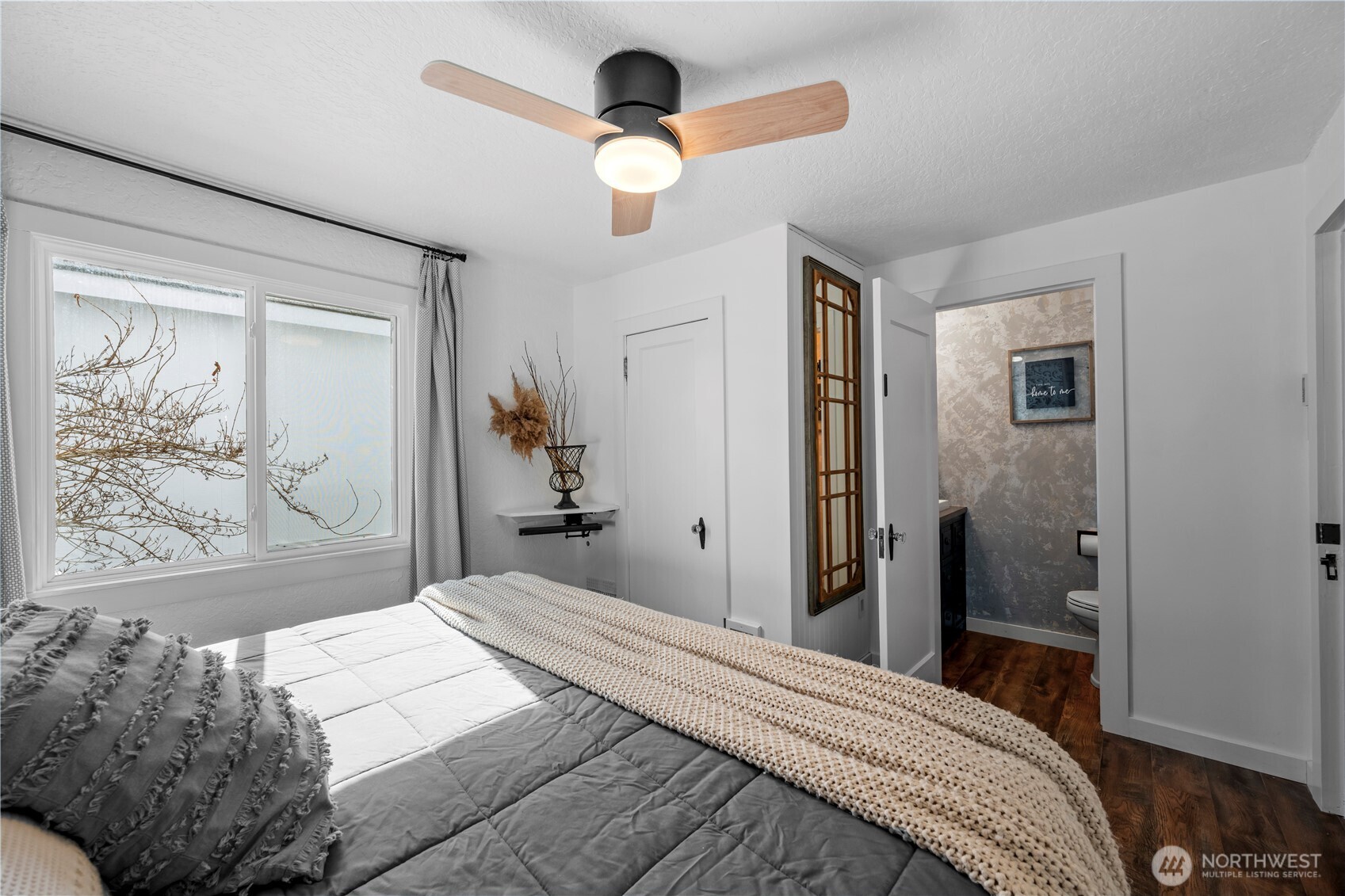 Another view of the primary bedroom.