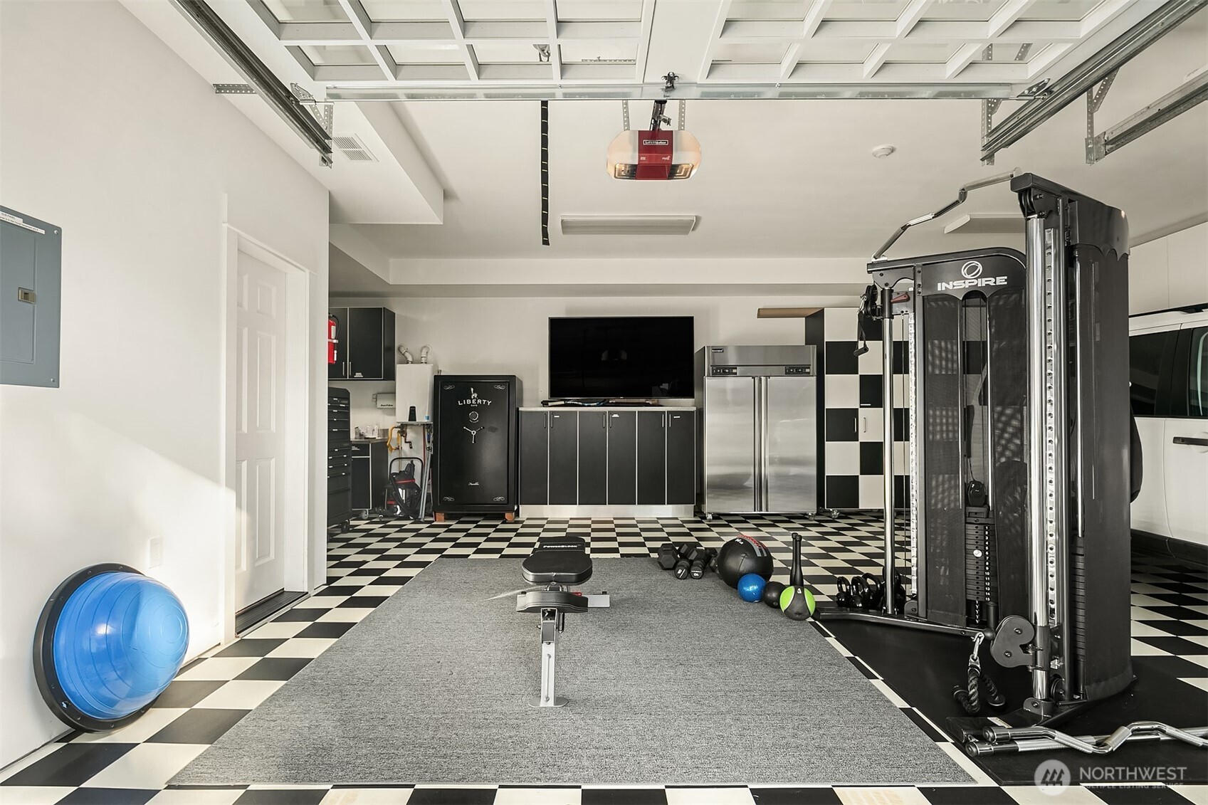 Two car garage with dedicated shop area