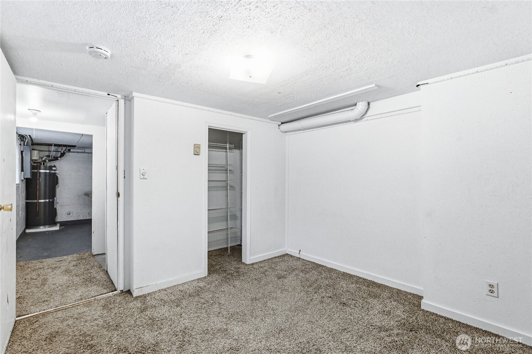 Generously sized primary bedroom featuring a rare ¾ ensuite bath—a major value-add for a home of this era. Ready for your personal touch to create a private retreat.