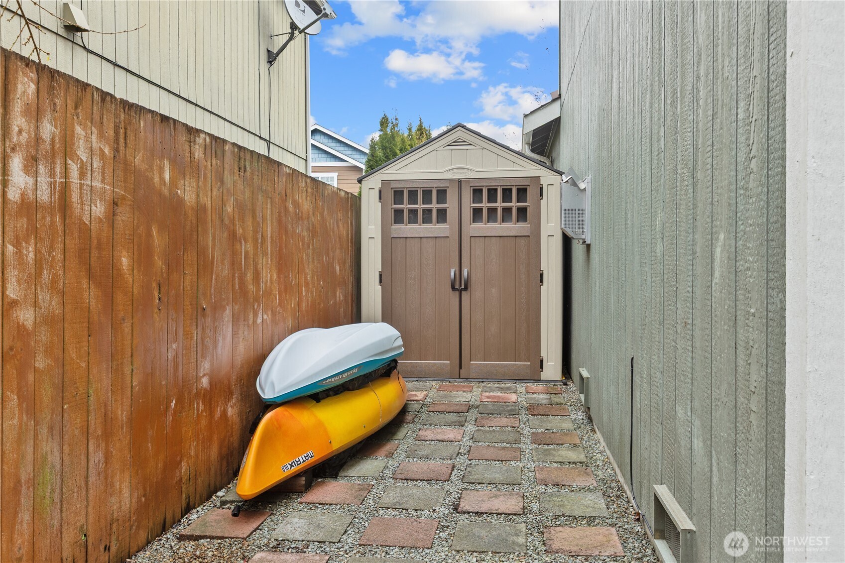 Side yard & shed offer additional storage!