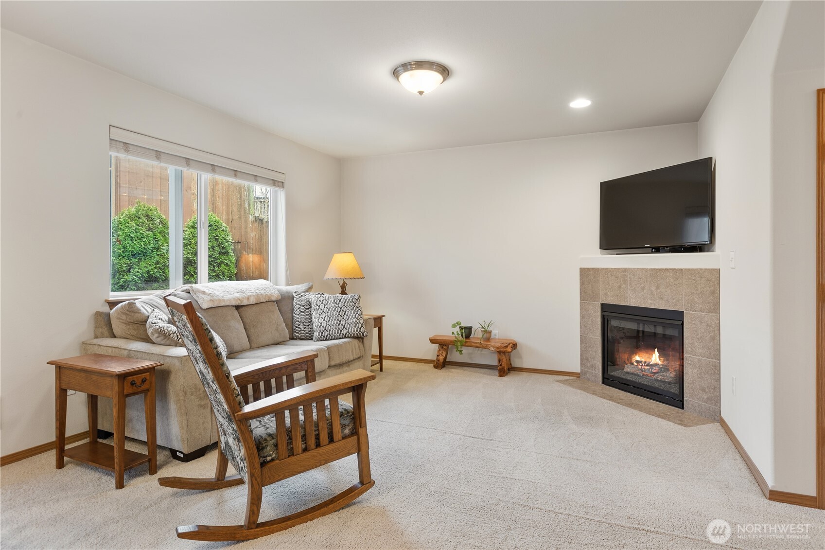 Living room features a cozy fireplace!