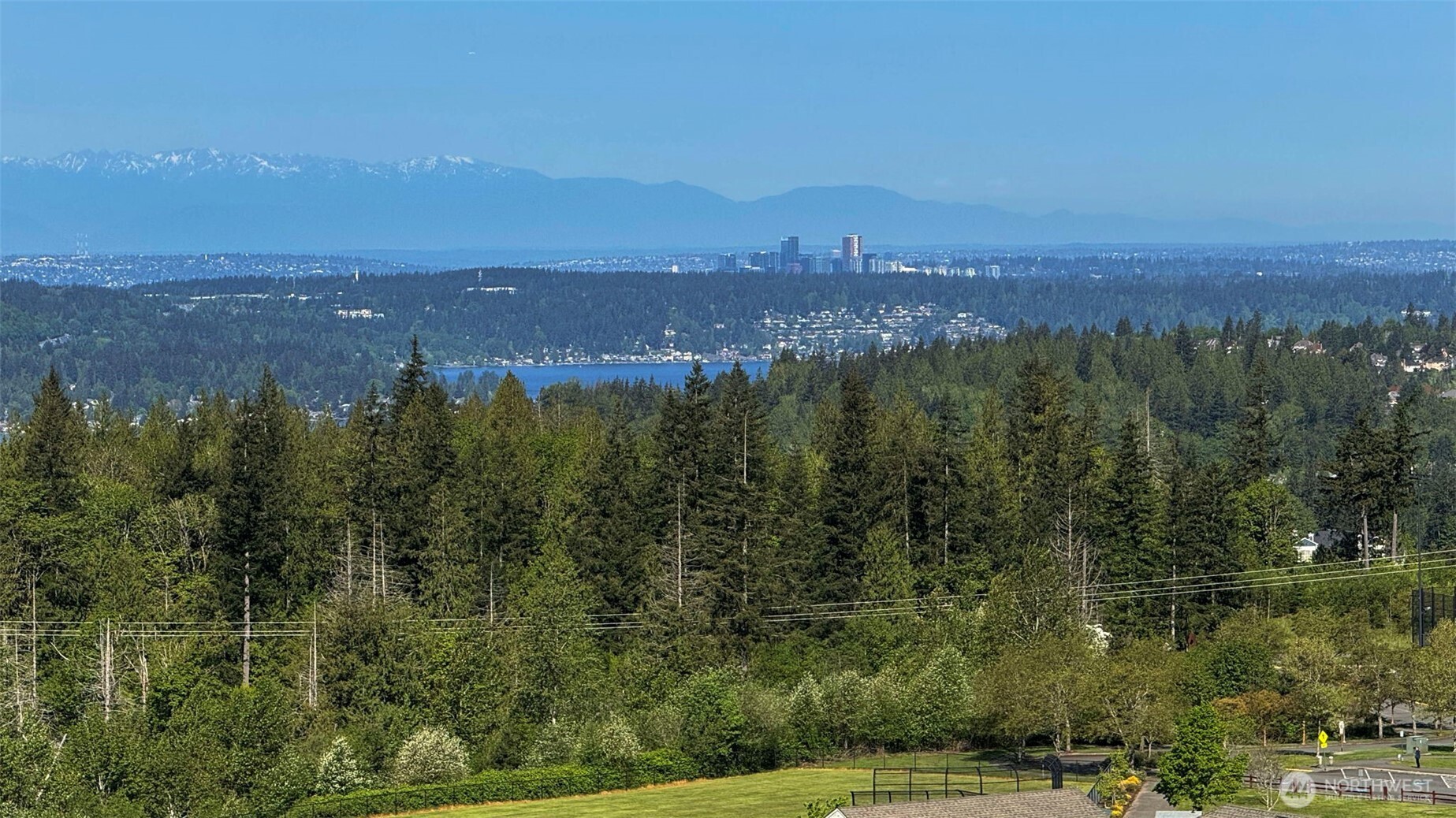 Enjoy the views of mountain, Lake Sammamish, Seattle and Bellevue cityscape views.
