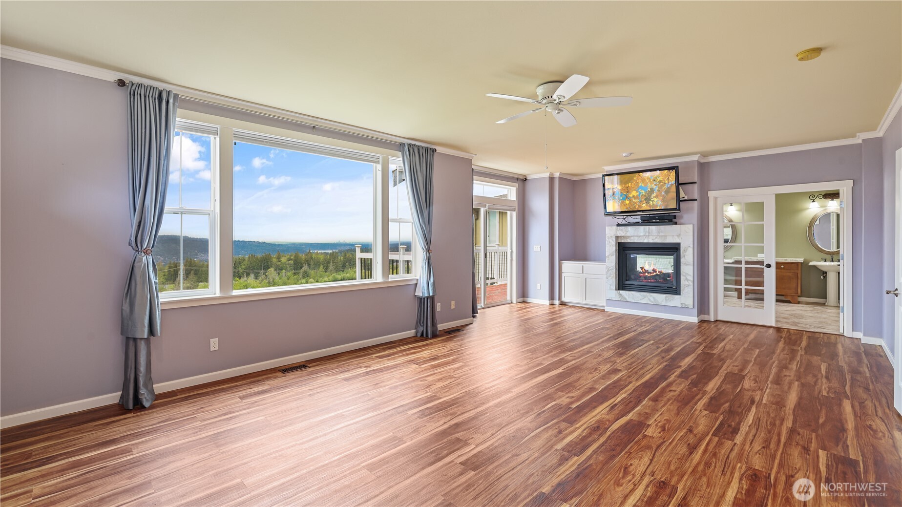 The primary bedroom features a private balcony—your own retreat to relax and take in the stunning views.