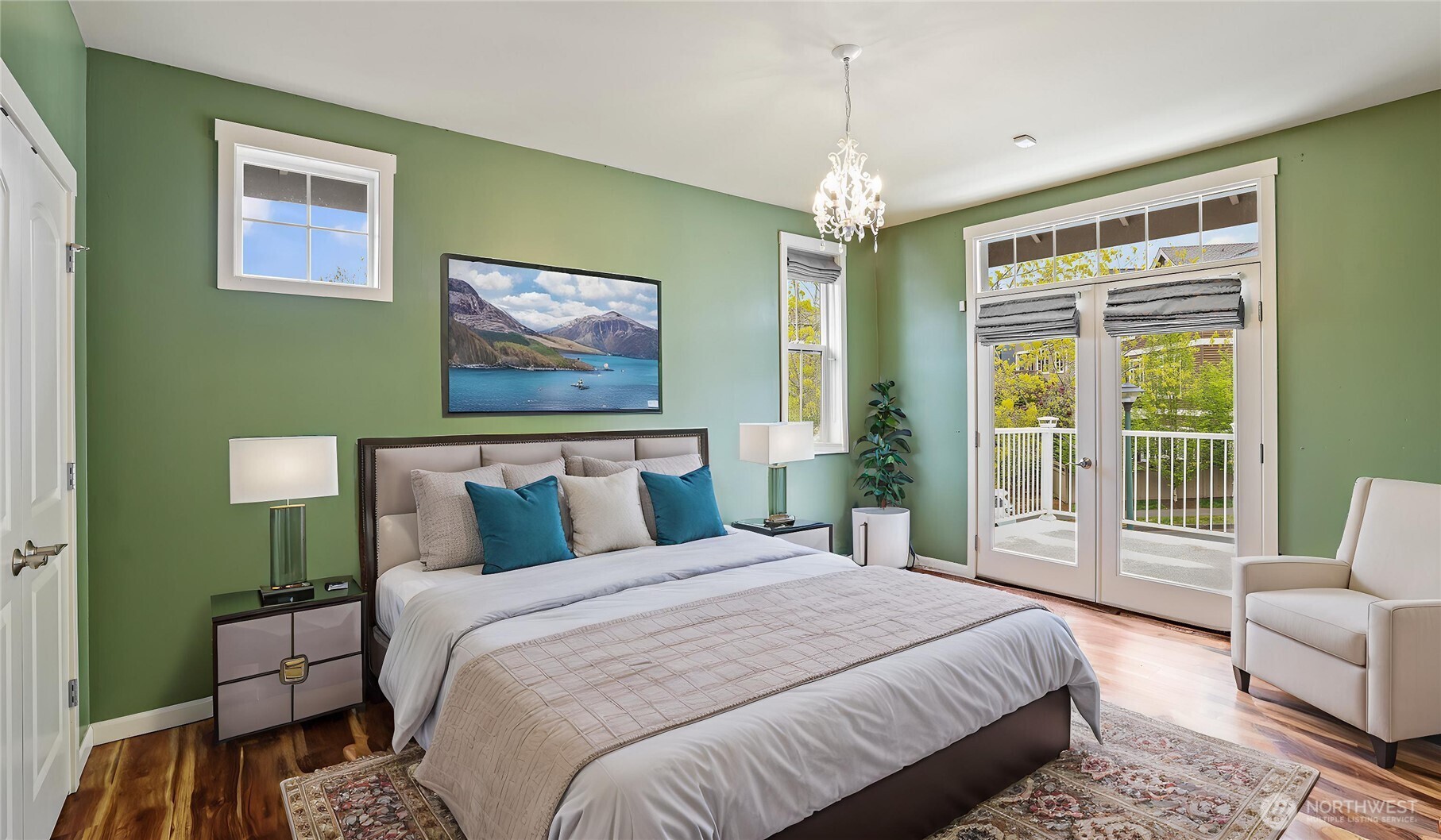 2nd bedroom showcases double doors leading to private deck.