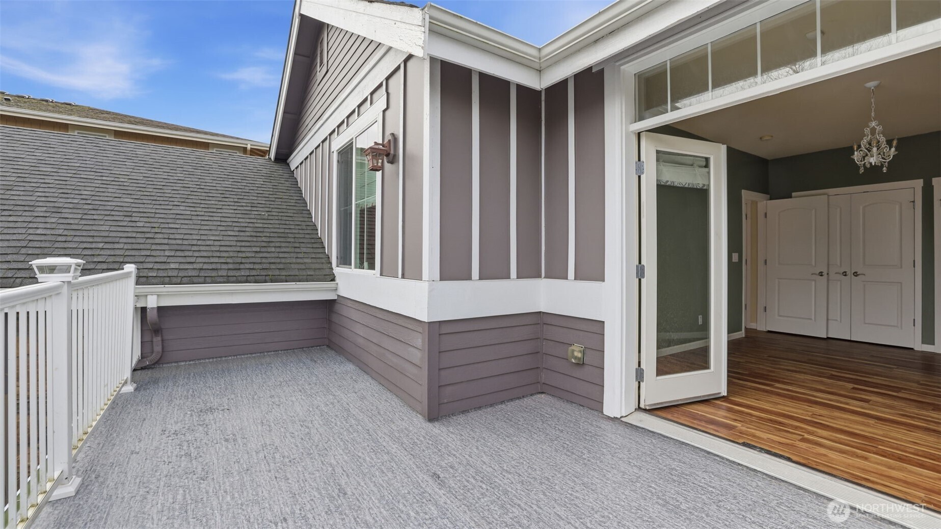 2nd bedroom showcases double doors leading to private deck.